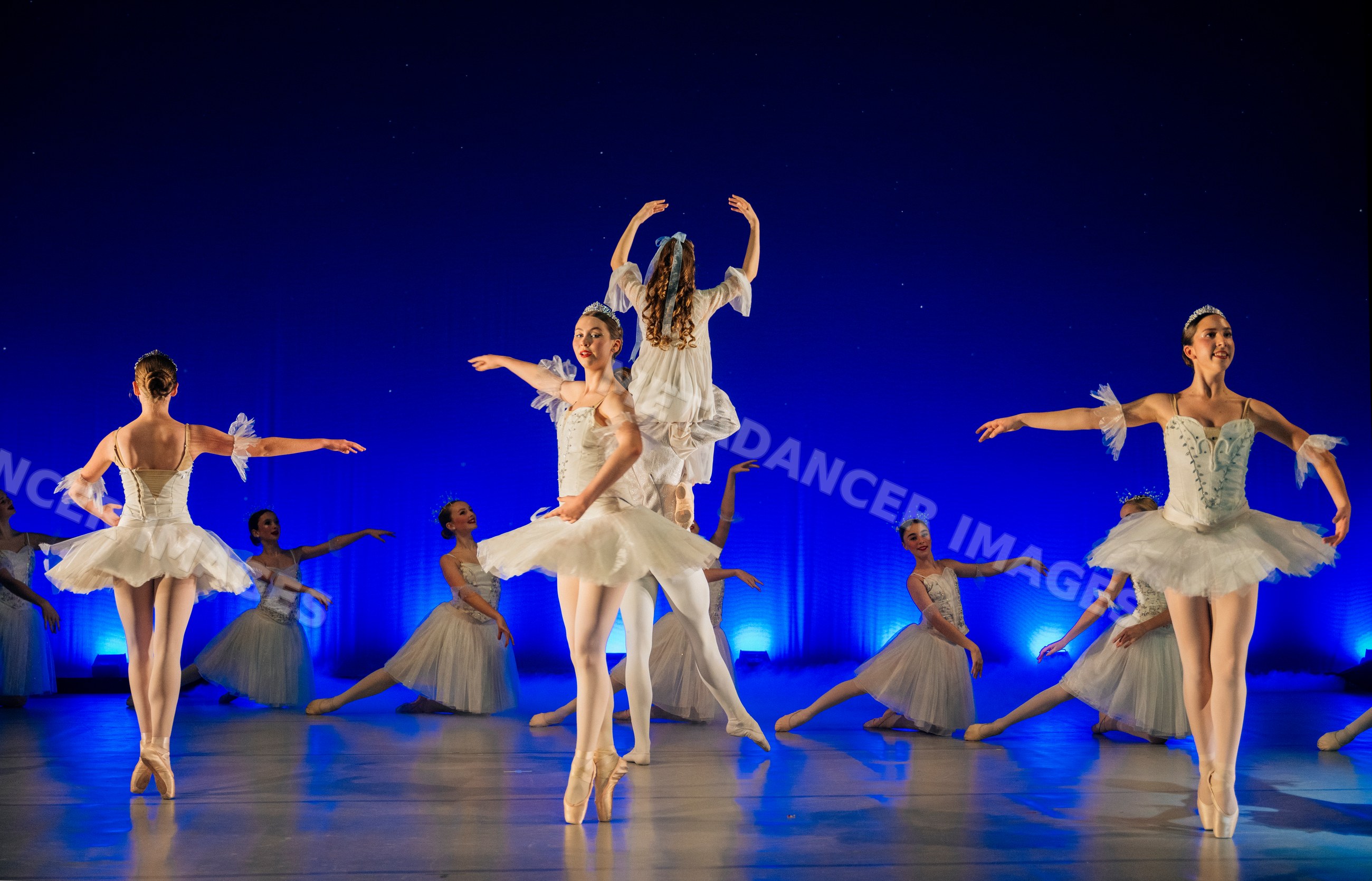 Ballerinas perform classical ballet on stage