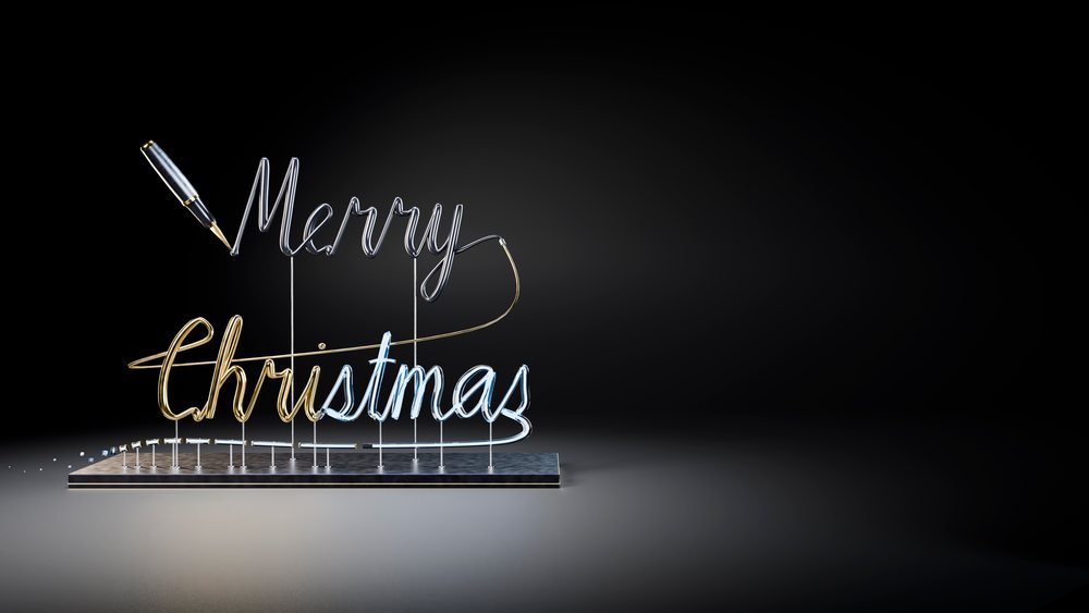 Merry christmas neon script sign with pen tip on black background
