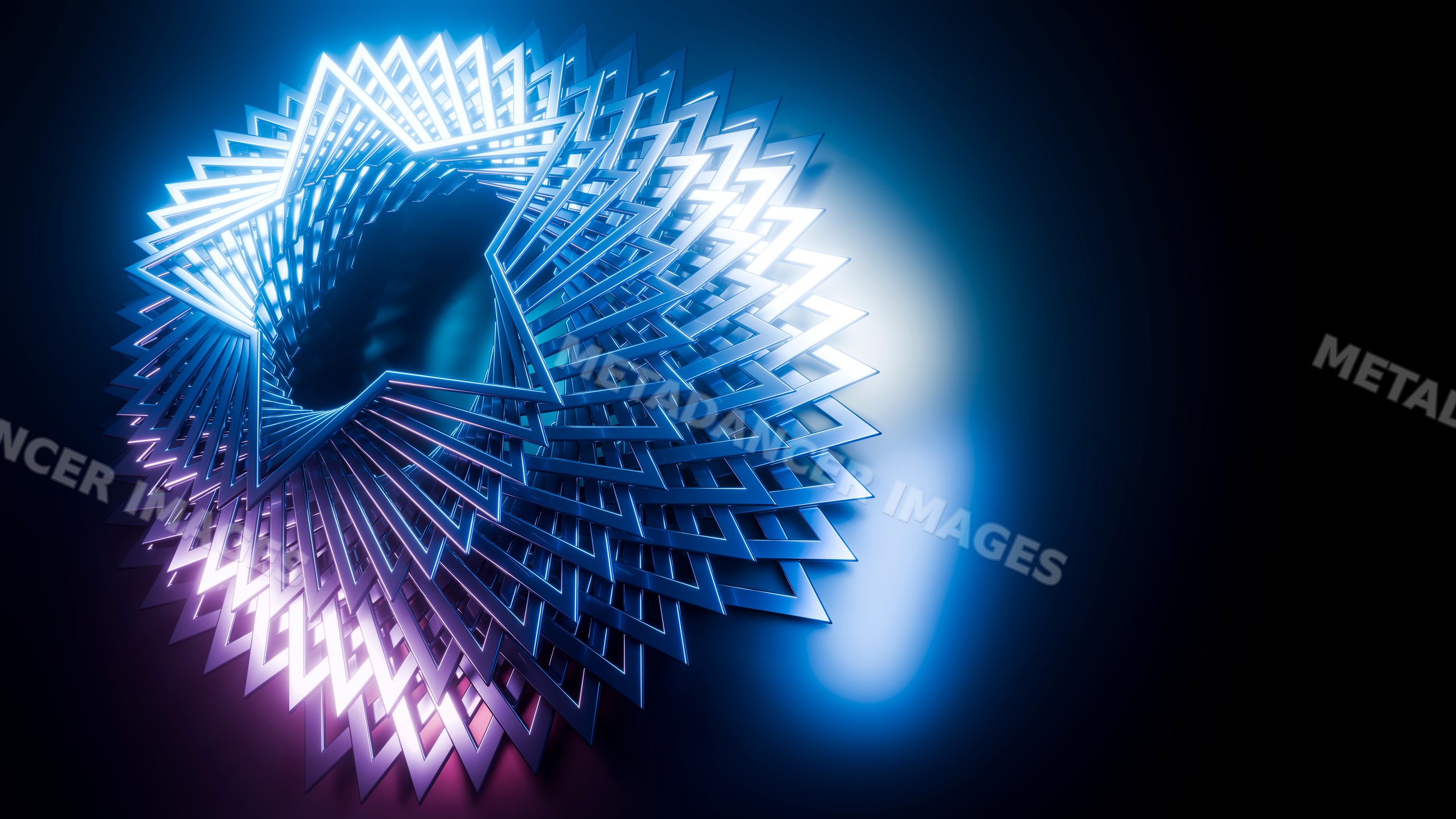 Abstract geometric metal sculpture illuminated