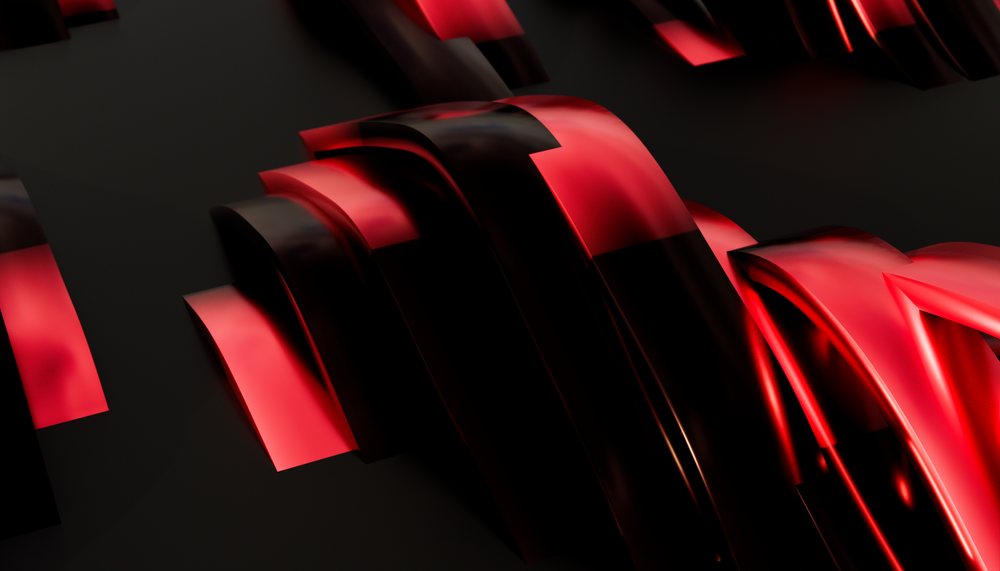 Abstract shiny black and red curves create a modern artistic