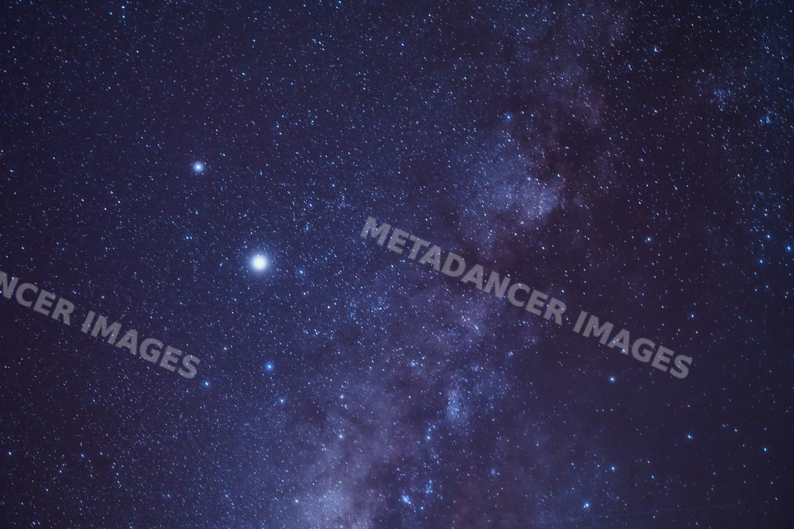 A star-filled night sky with the milky way galaxy over the Maldives