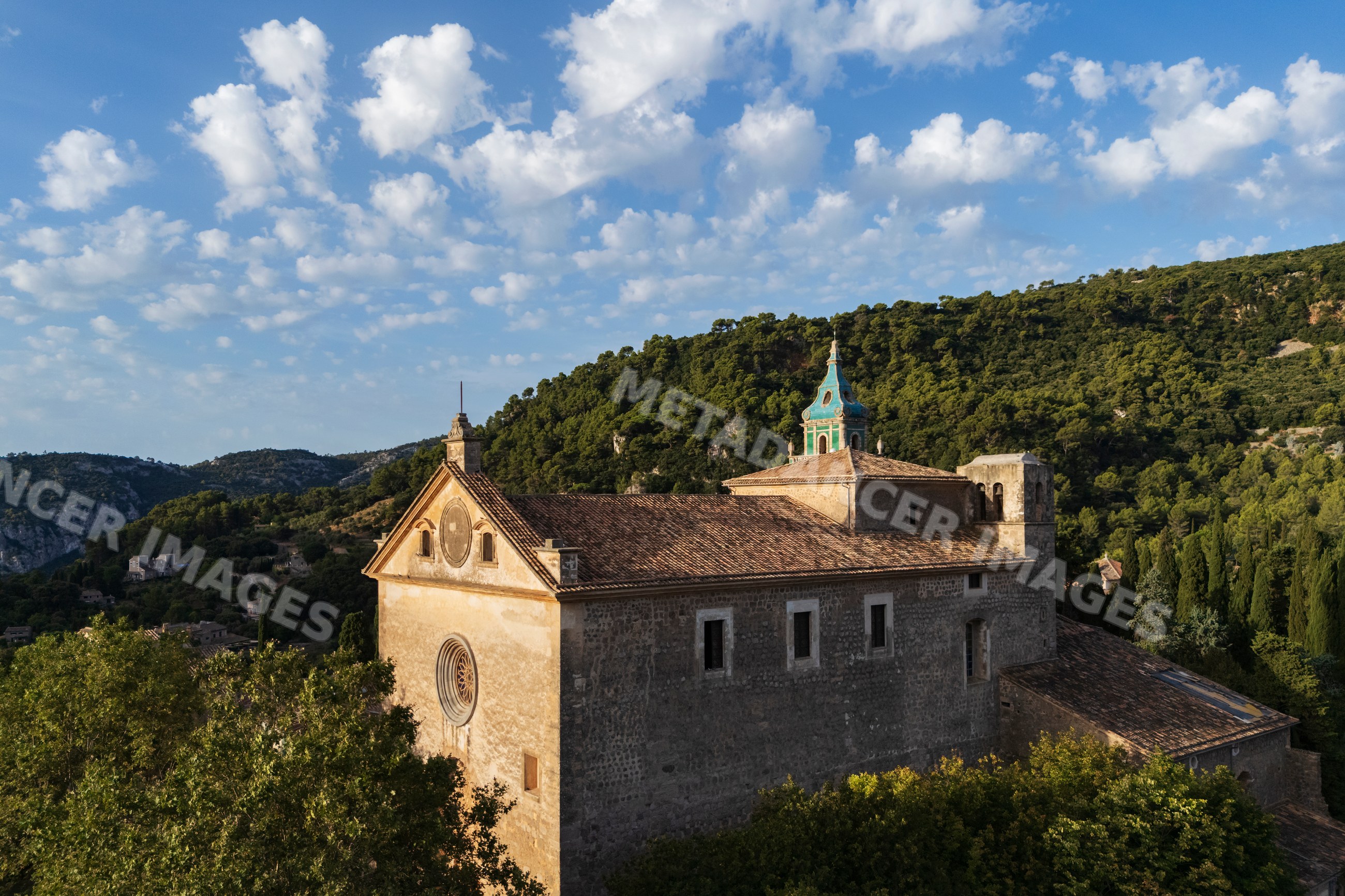 Sunrise over a historic church in valdemossa, Mallorca, Spain