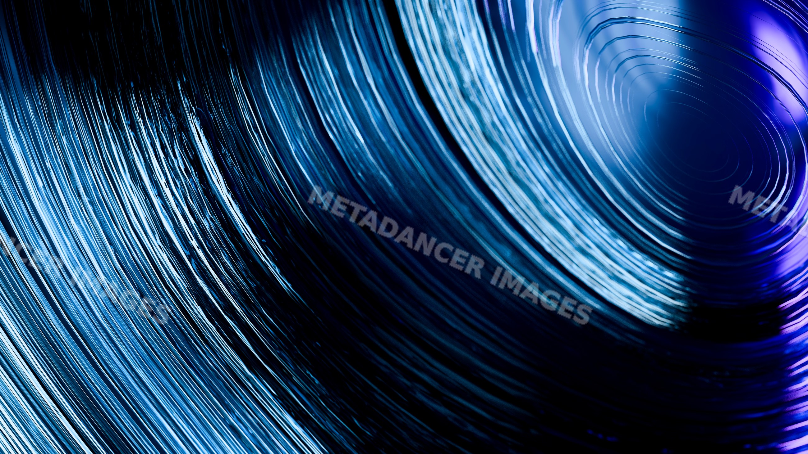 Close-up of blue rolled steel coils showing metal texture