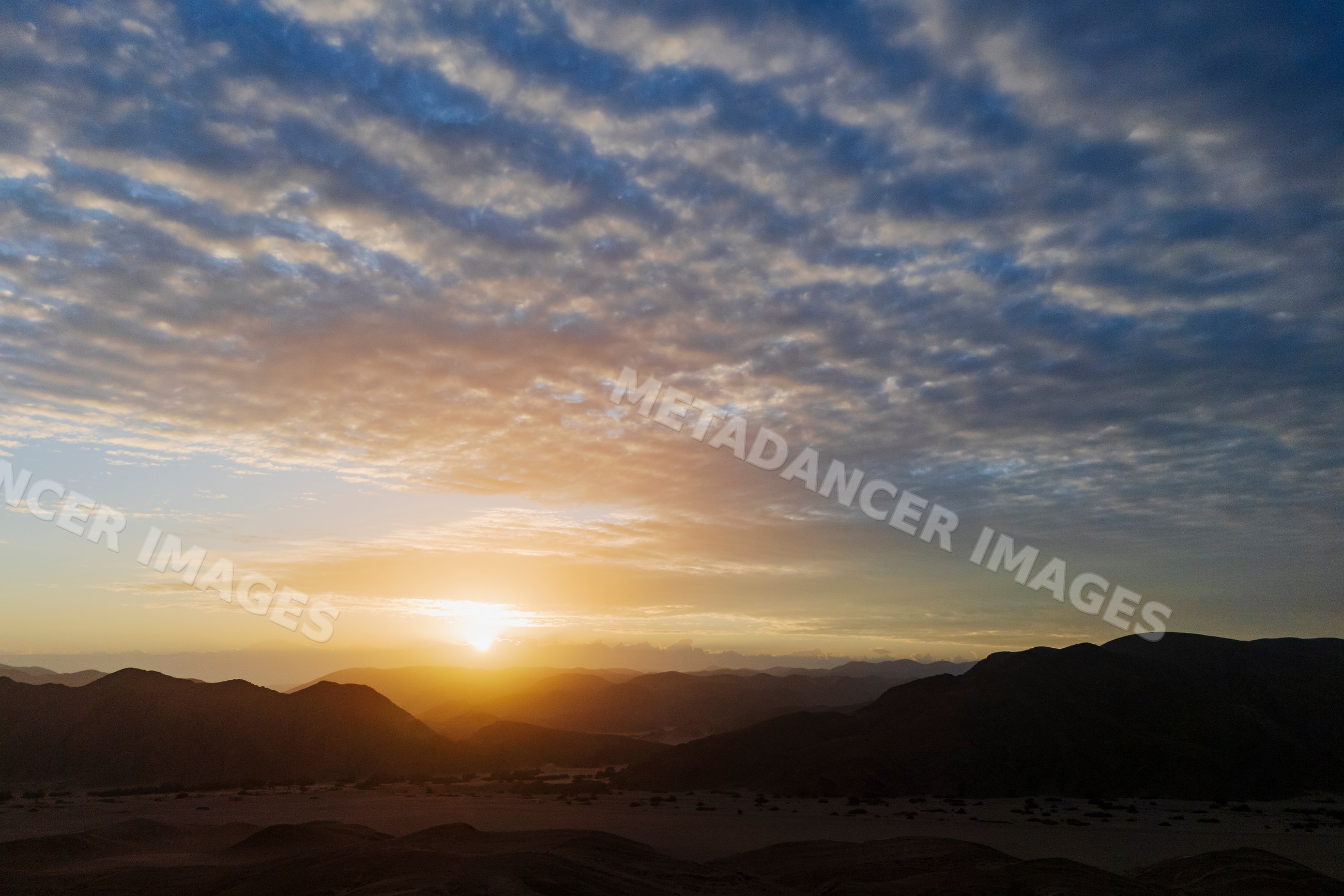 Sunrise over hoanib river valley in Namibia's kunene region