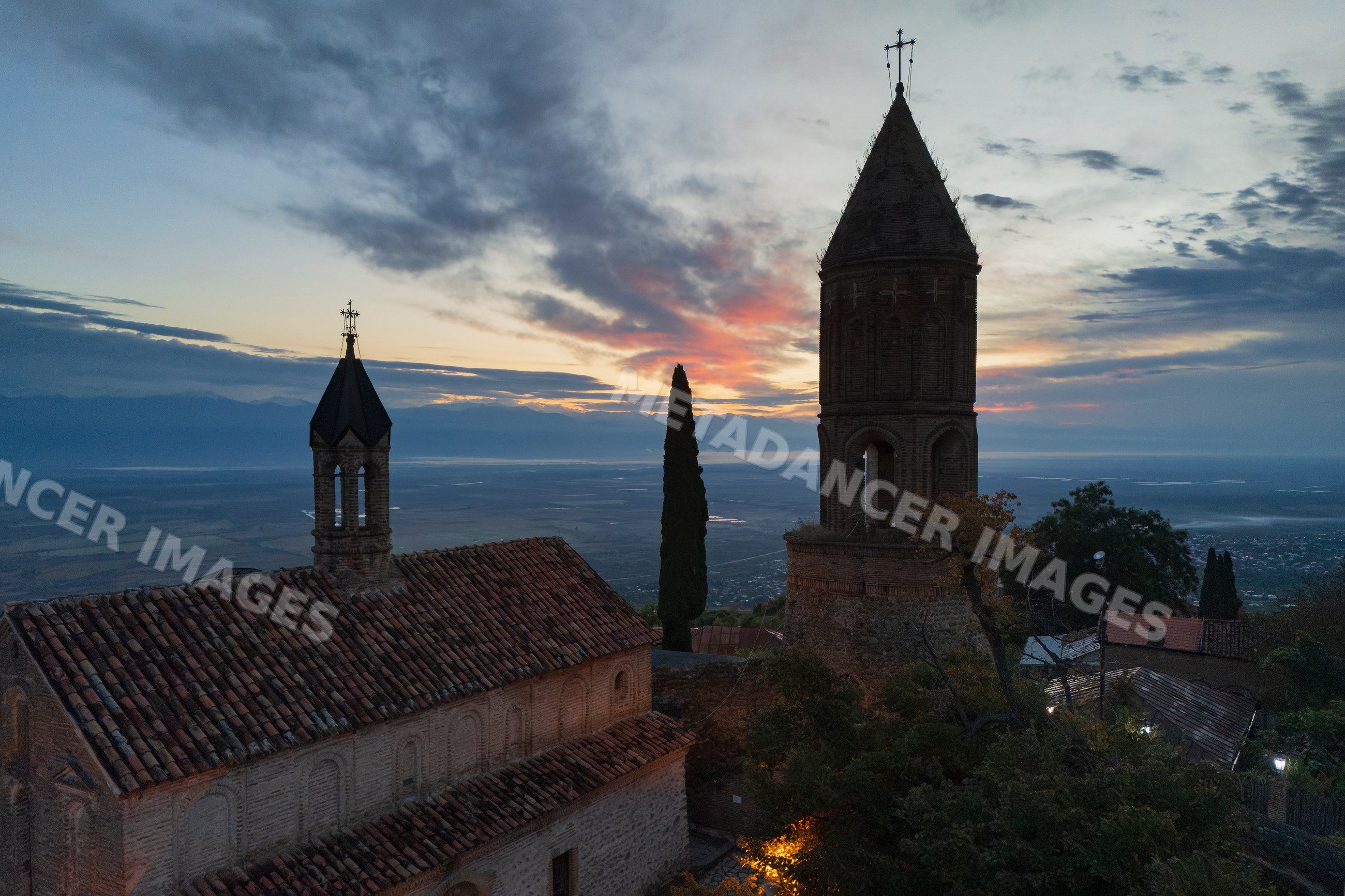 St George's Church with bell tower at sunset in sighnaghi, Georgia