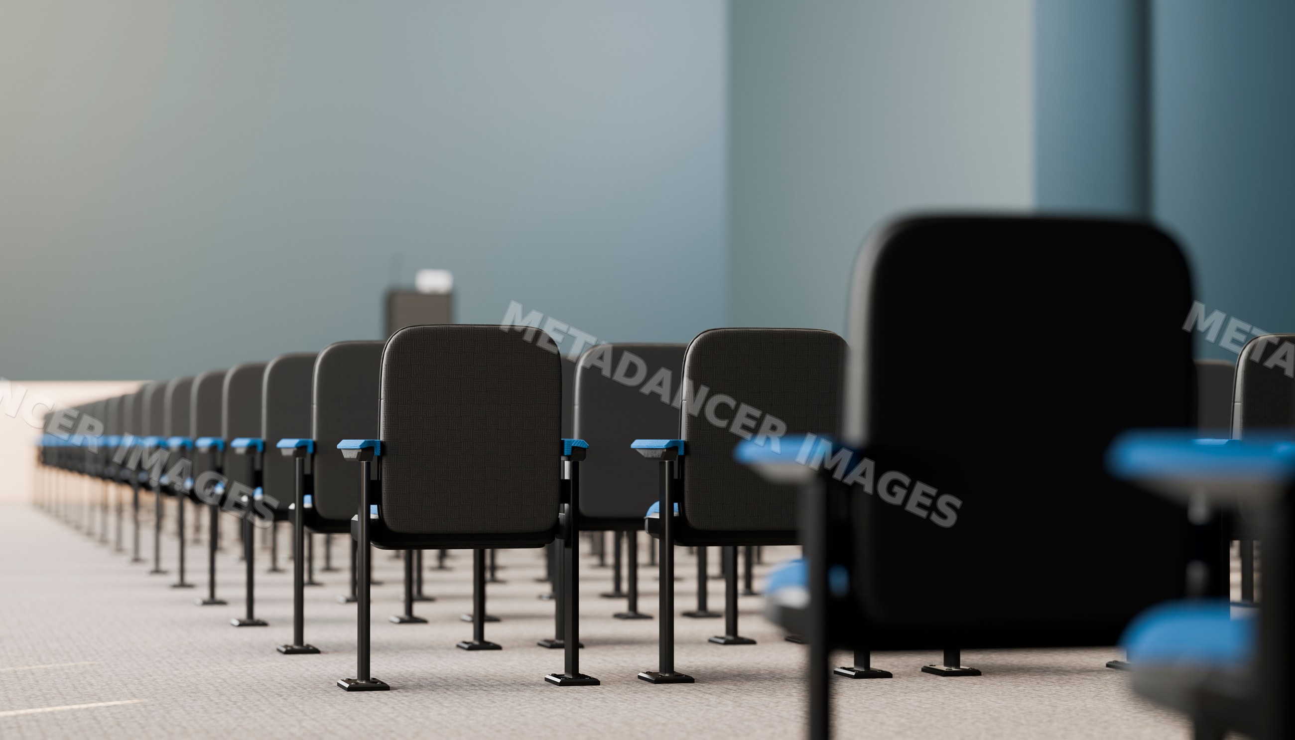 Rows of black chairs with blue armrests in a conference room