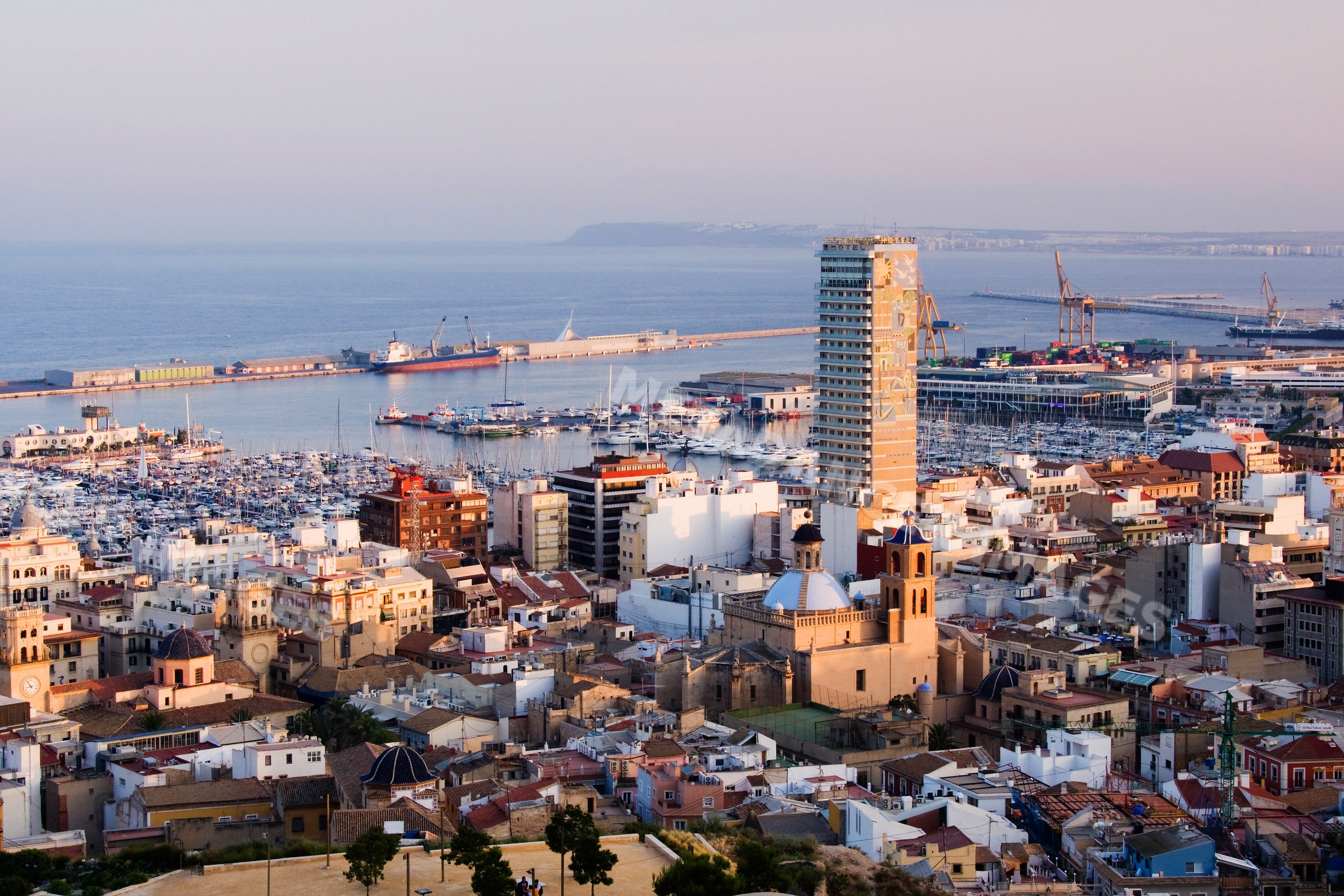 Alicante harbor and cityscape along the mediterranean sea