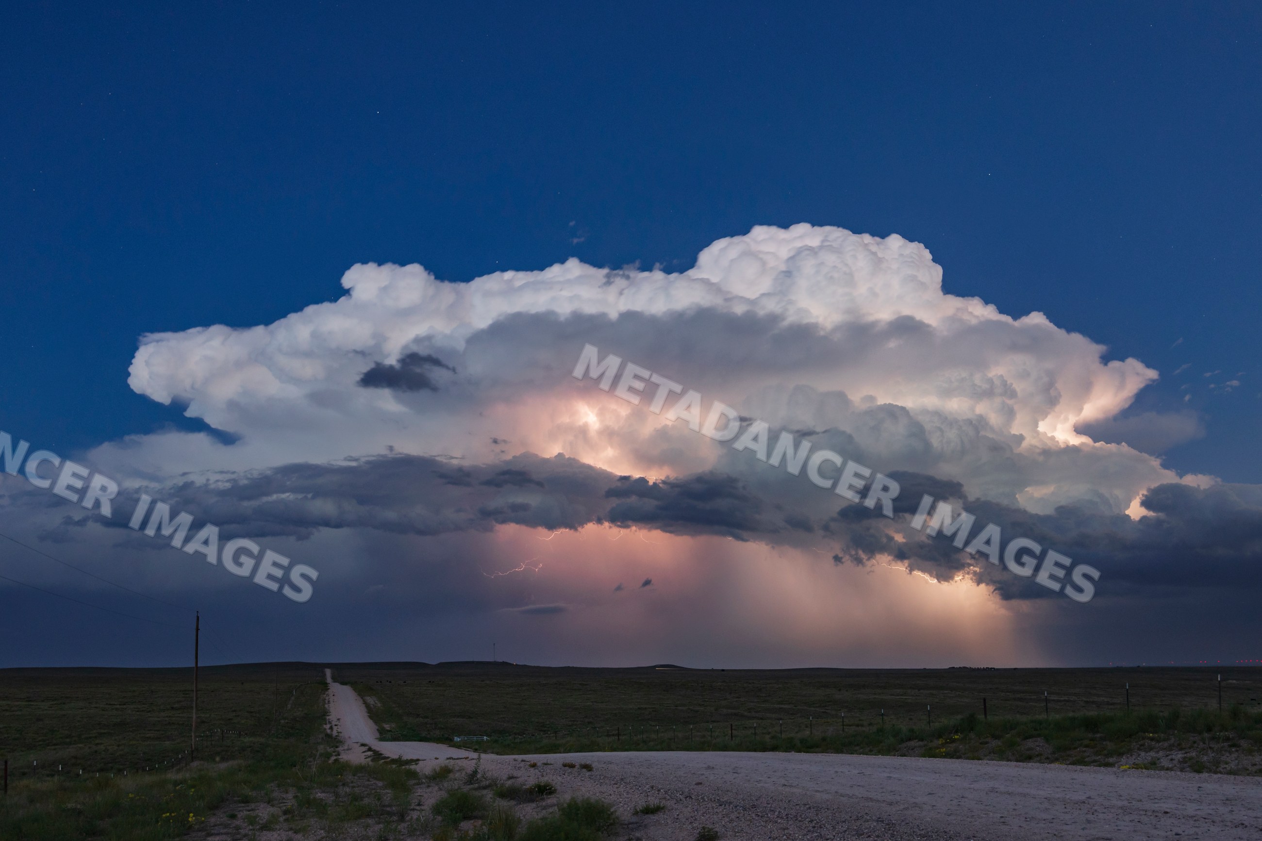 Lightning striking within Supercell thunderstorm over new mexico