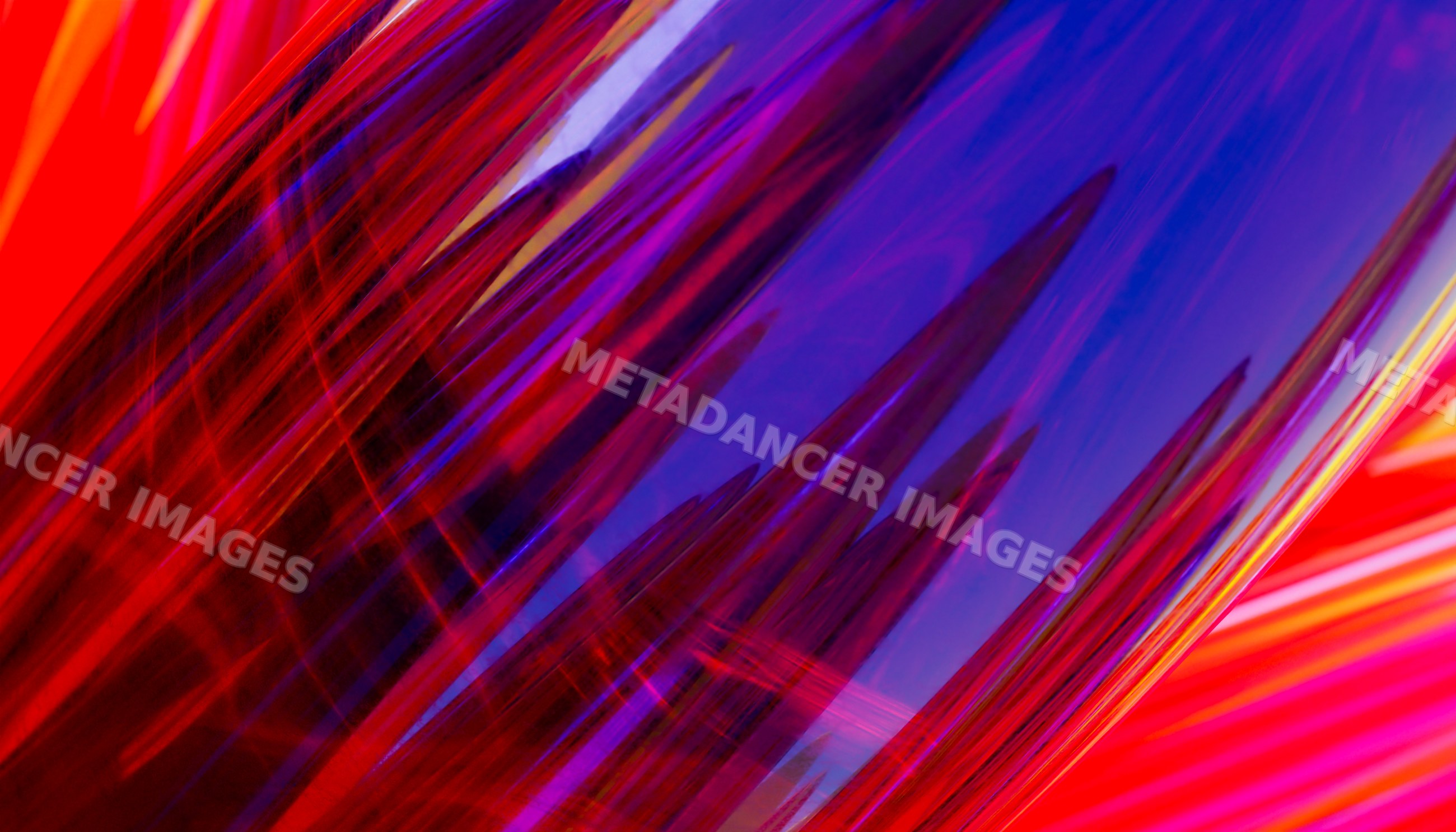 Close-up abstract colorful glass with vibrant red and purple