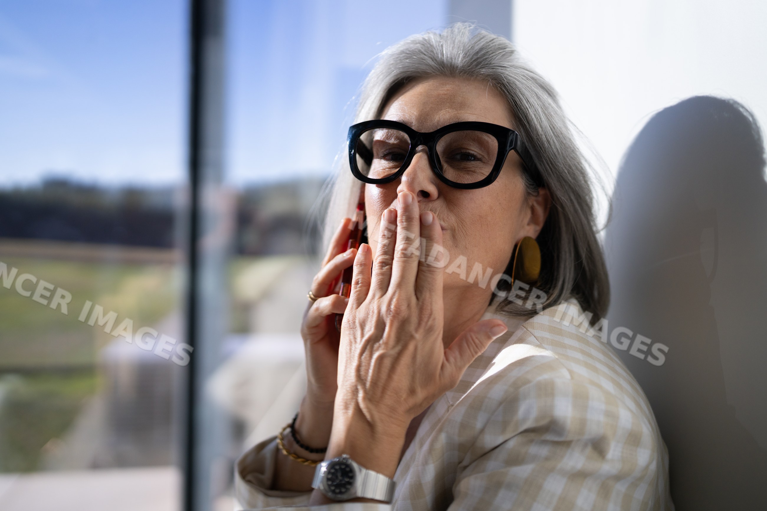 White woman blowing a kiss