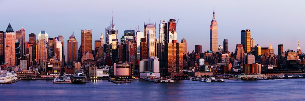 New york city skyline with empire state building at sunset