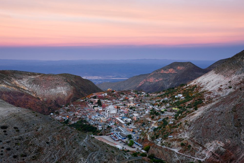 Real de catorce town nestled in mountains at sunset mexico