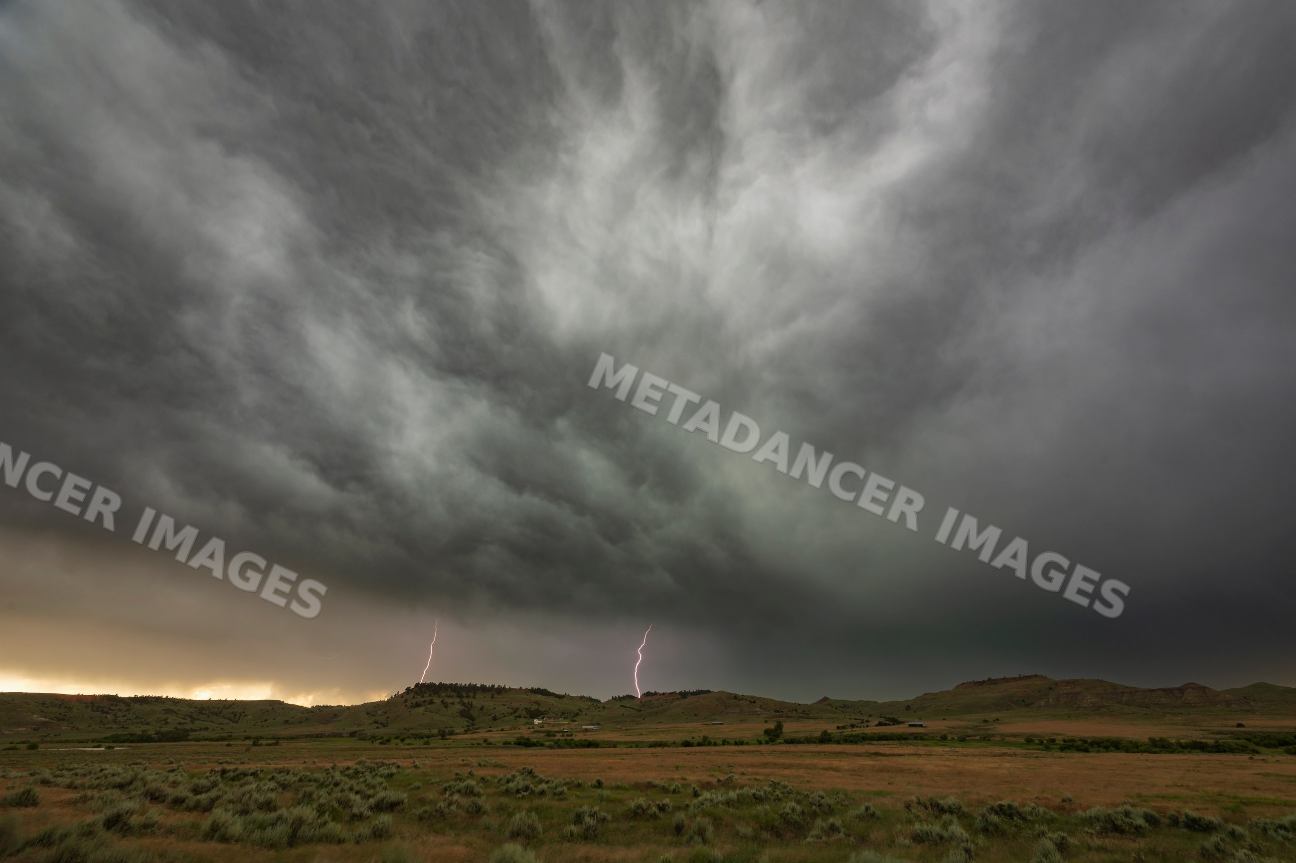 Lightning strikes under Storm Clouds near gillette, wyoming