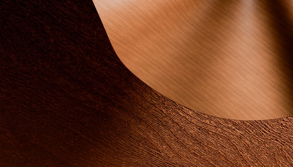 Curved wood surfaces showcasing detailed light and dark grain textures