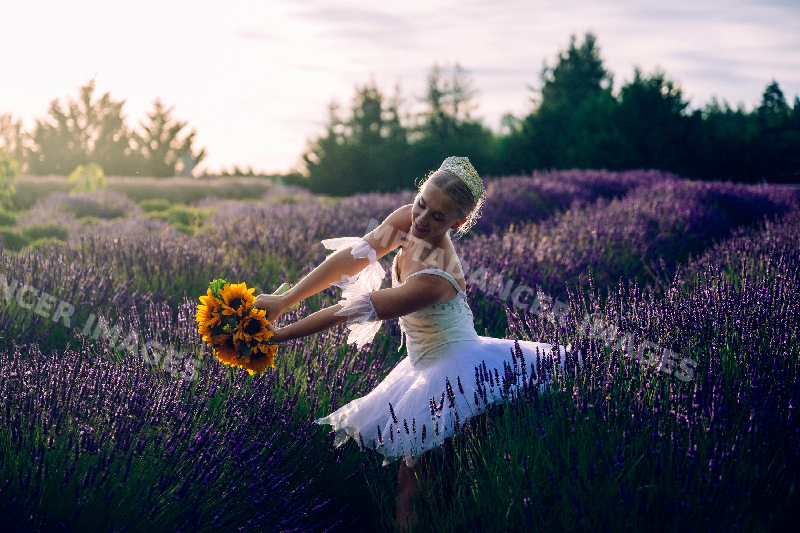 A white woman dances with sunflowers