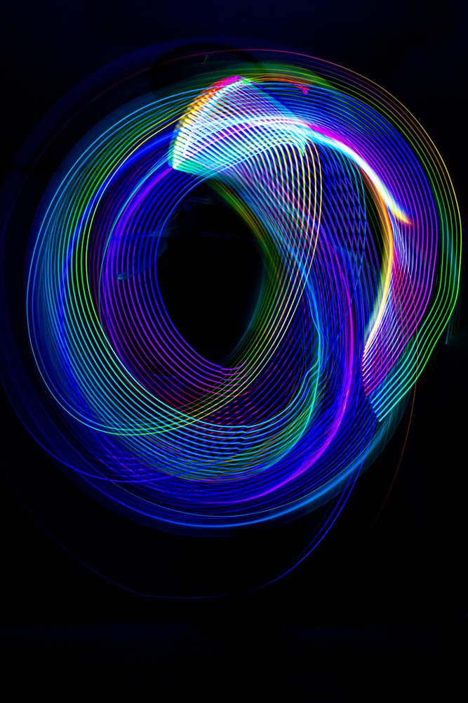 Colorful LED light painting with vibrant swirling spirals