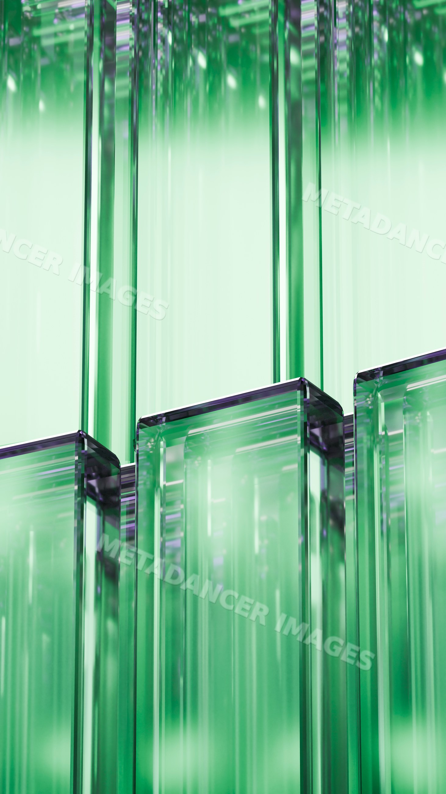 Abstract green translucent glass blocks in vertical arrangement