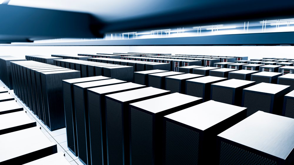 Data center interior with rows of server racks and computer servers