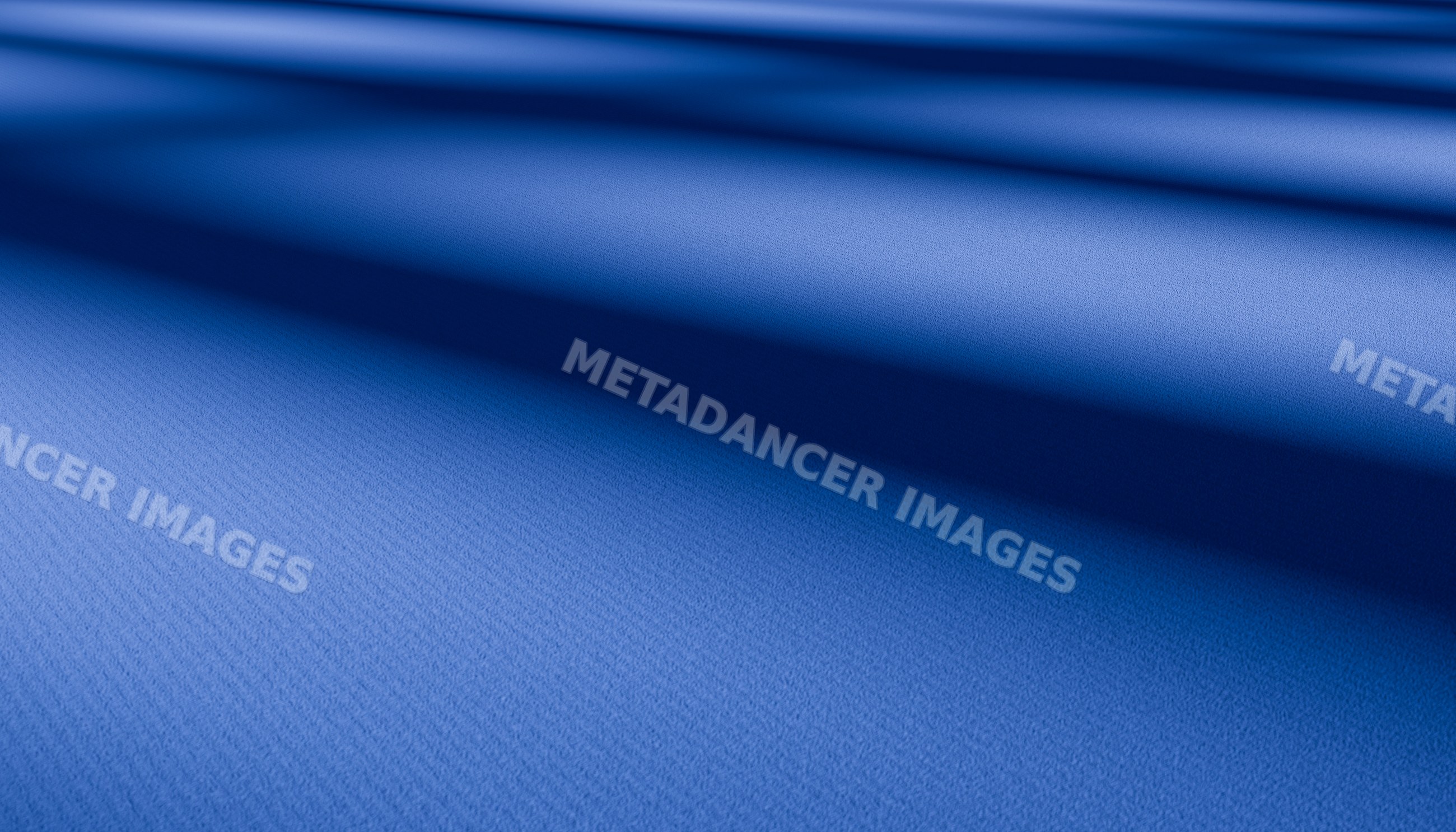 Closeup of soft blue fabric with folds and textured surface