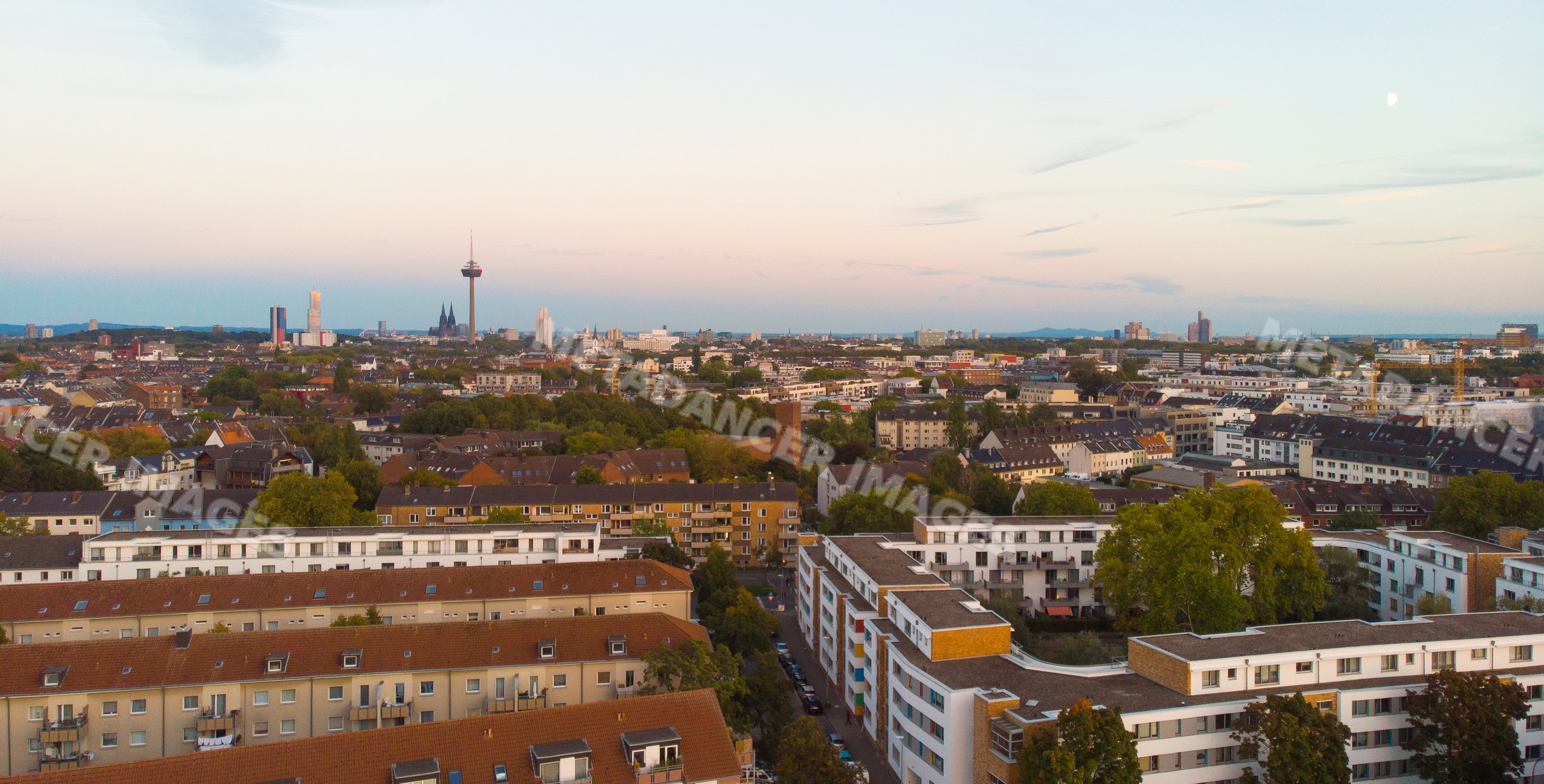 Urban residential area with communication tower in Cologne cityscape