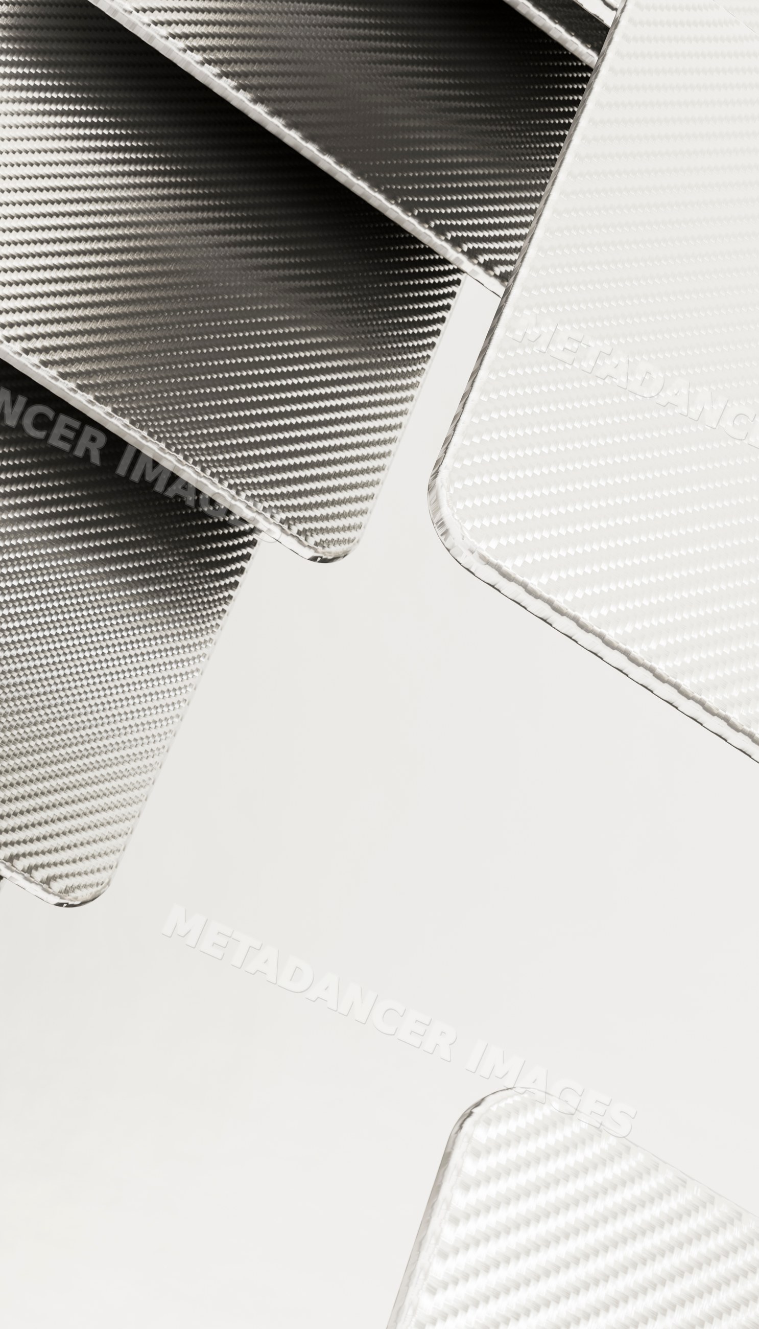 Close-up of black and white carbon fiber textile weave texture