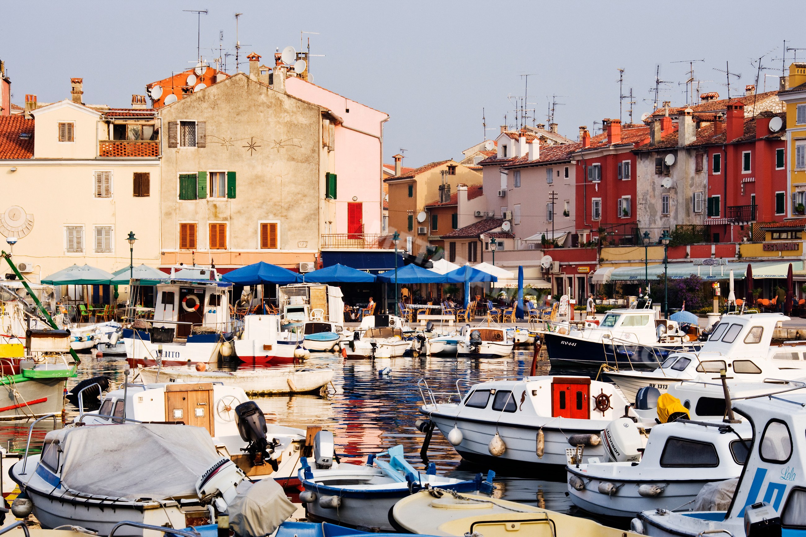 Boats moored in the harbour of rovinj, croatia