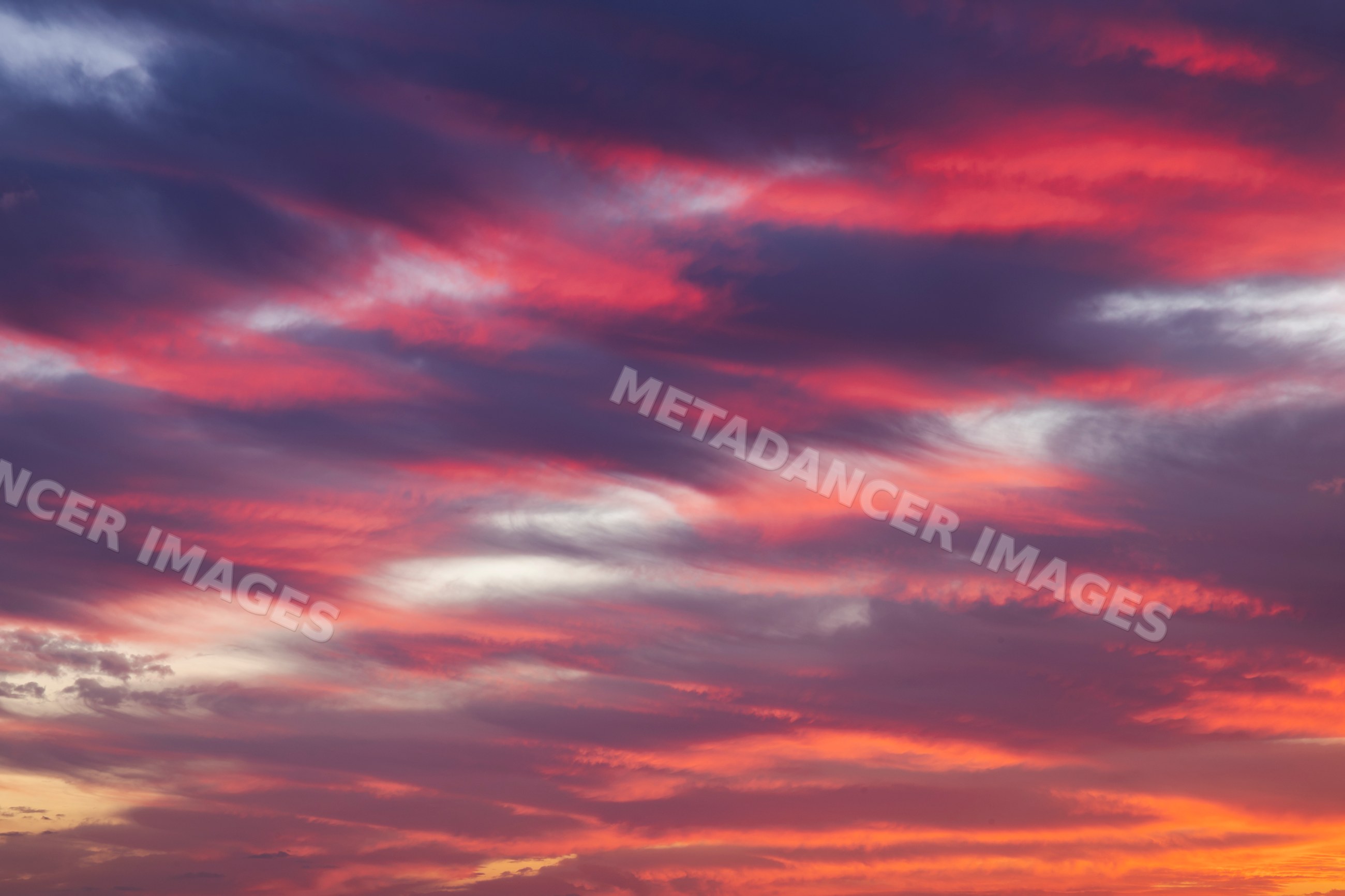 Sunset sky with dramatic red clouds over Bonifacio