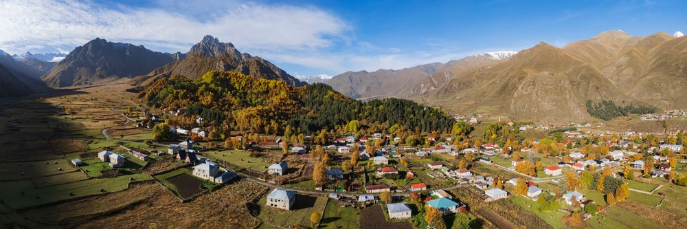 Sioni Village in mountain valley with autumn foliage in kazbegi region