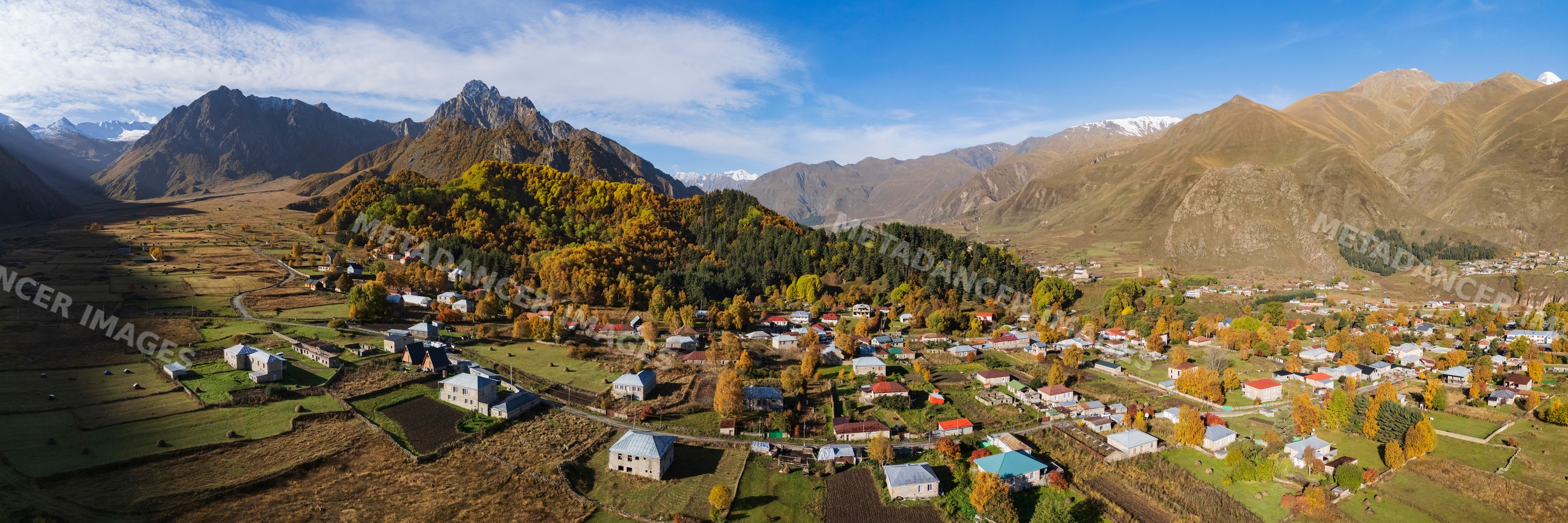 Sioni Village in mountain valley with autumn foliage in kazbegi region