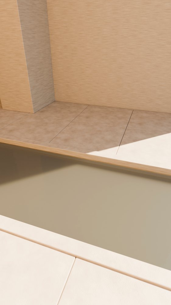 Tile floor and wall corner with beige and brown tiles in indoor space