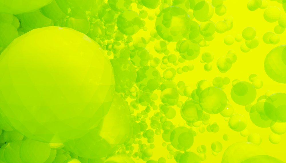 Digital 3d yellow transparent spheres floating in an abstract pattern