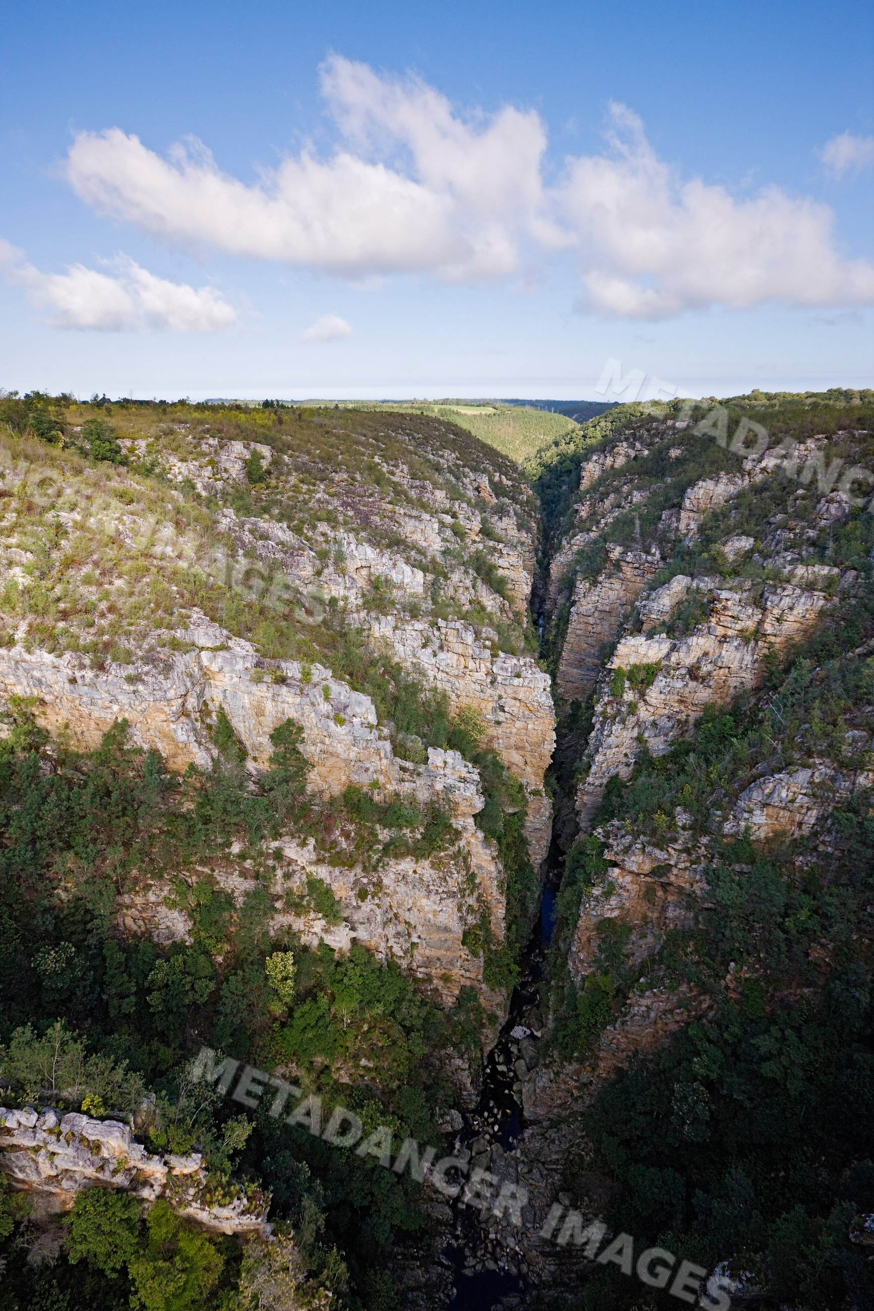 Storm's river flowing through steep rocky gorge south africa