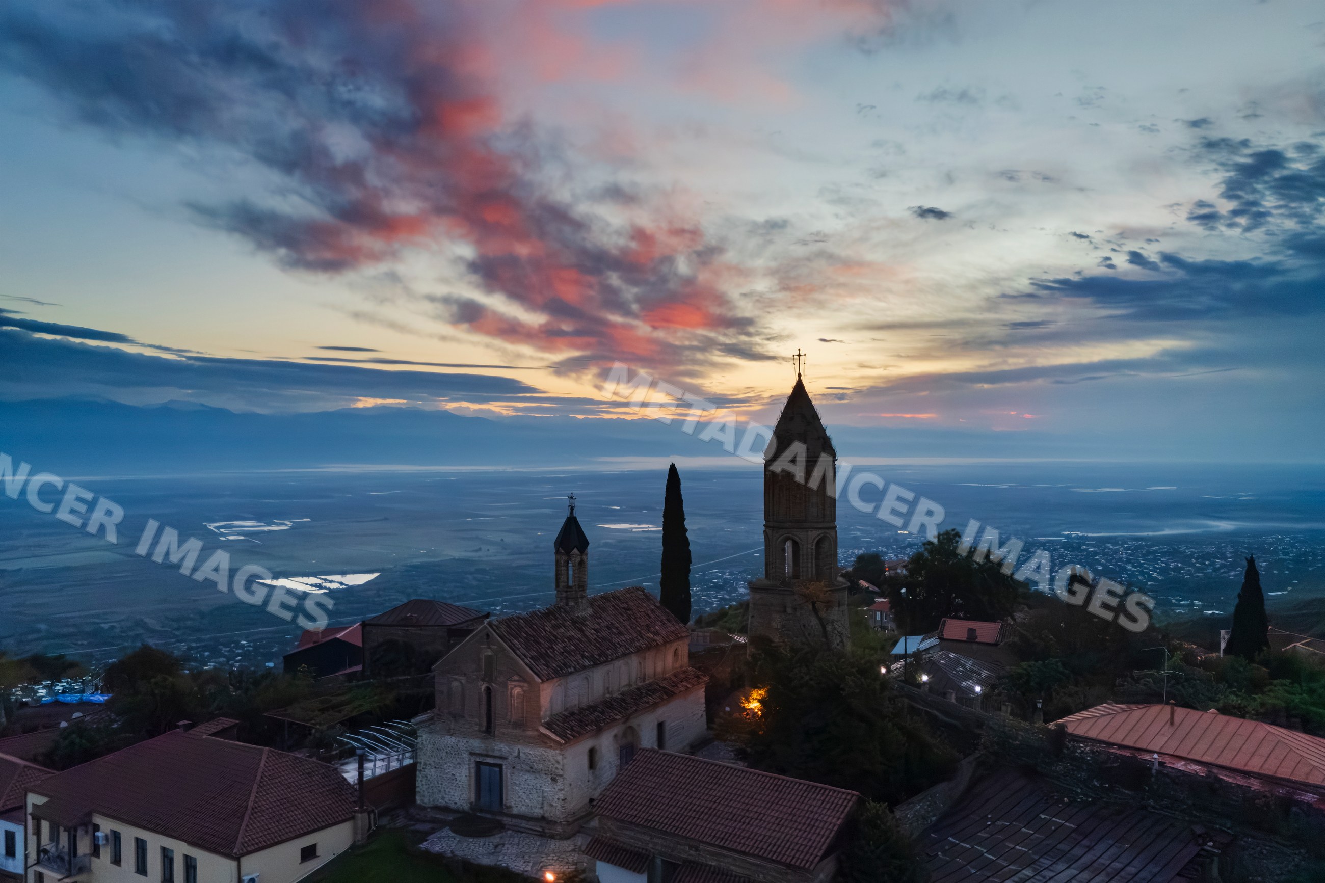 St George's Church tower at sunset in sighnaghi, Georgia