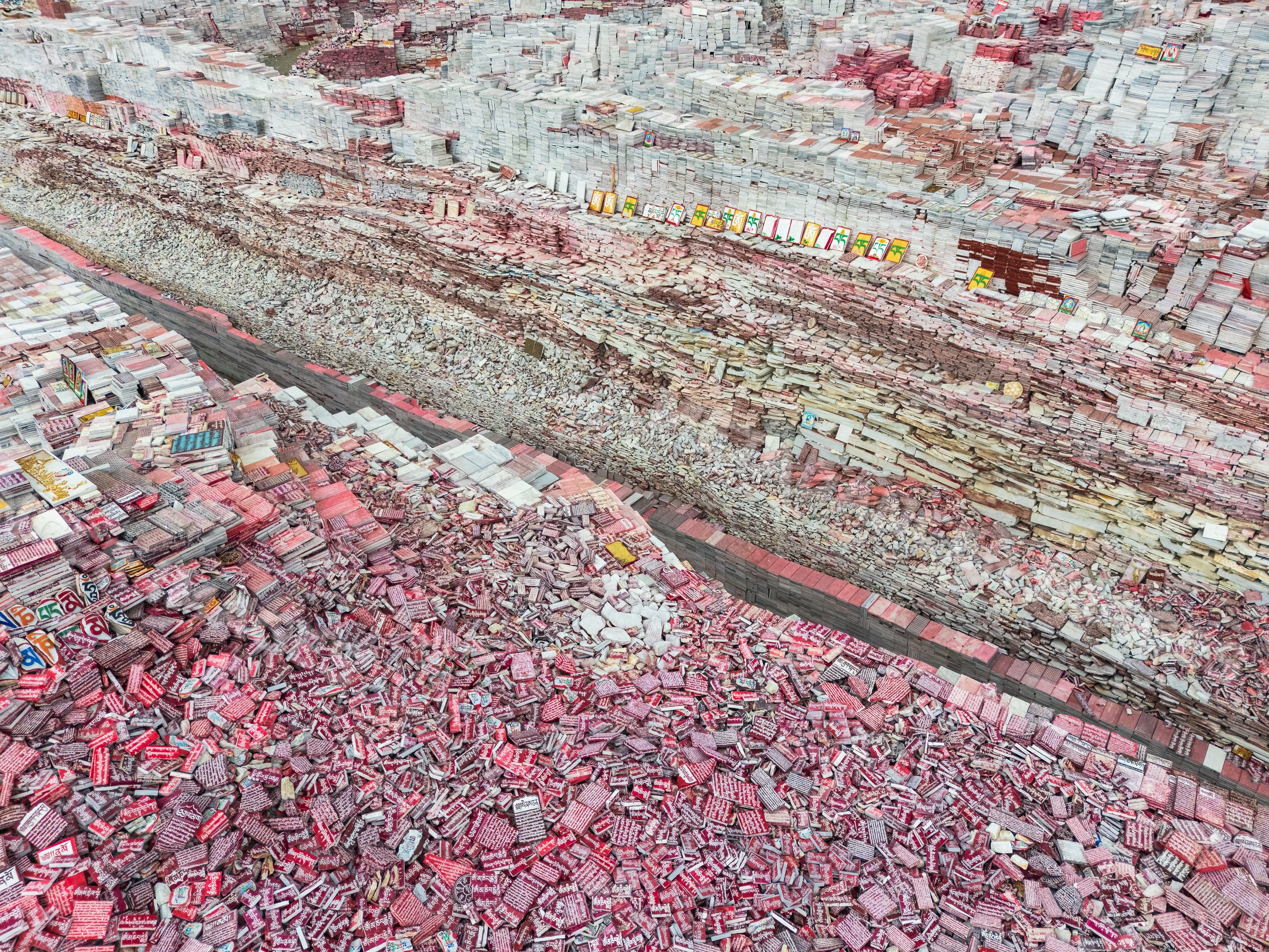 Aerial view of Jiana Mani City with densely stacked mani stones