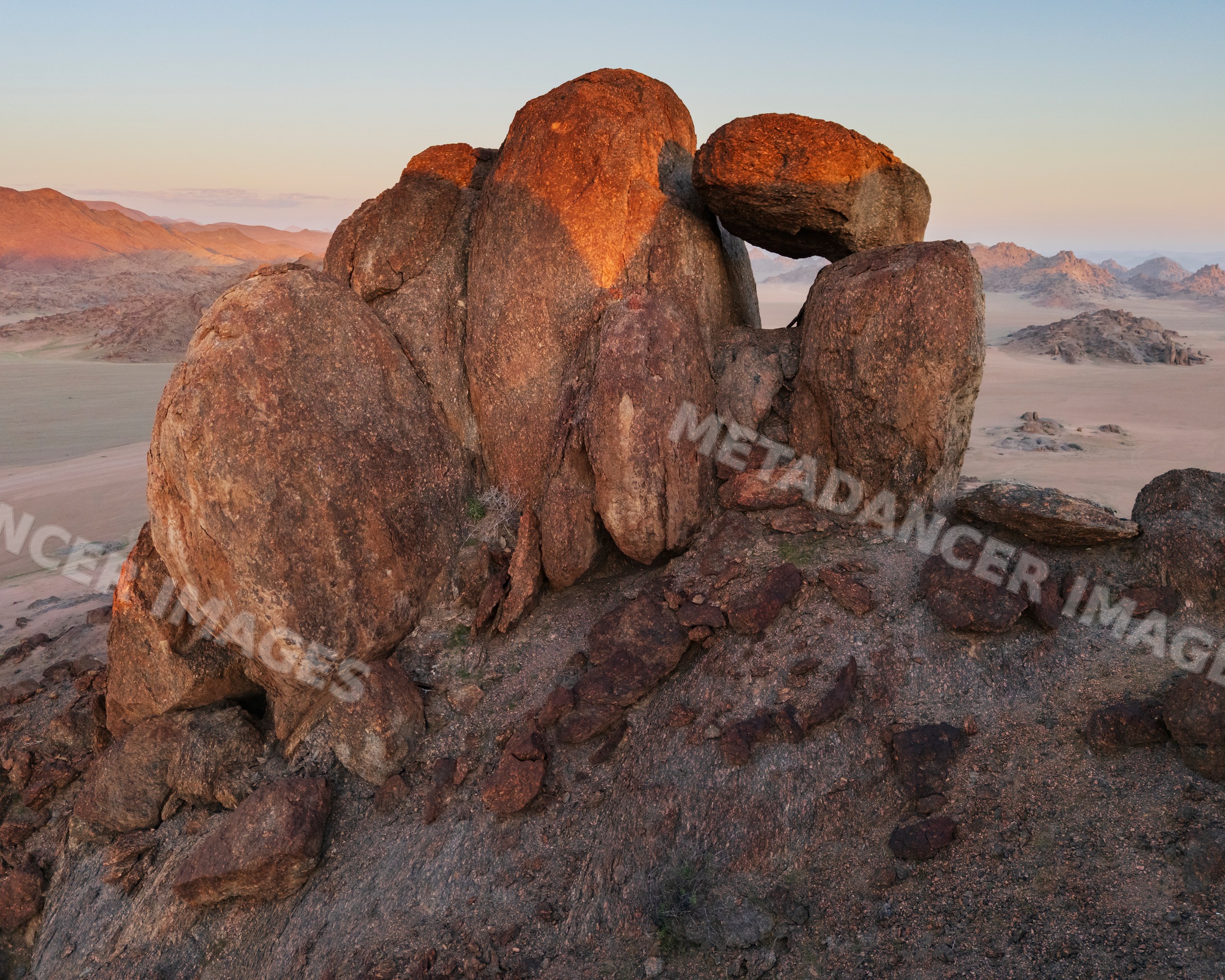 Balanced rock formation at Sunset in stone valley Namibia
