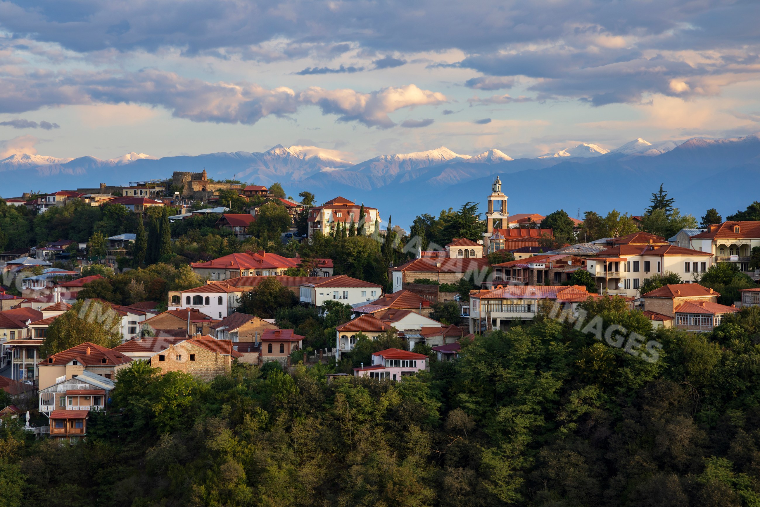 Town of Sighnaghi with the Caucasus Mountains