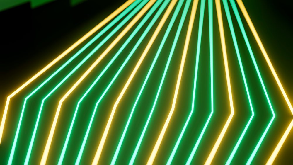 Abstract neon lights with yellow and green glowing lines