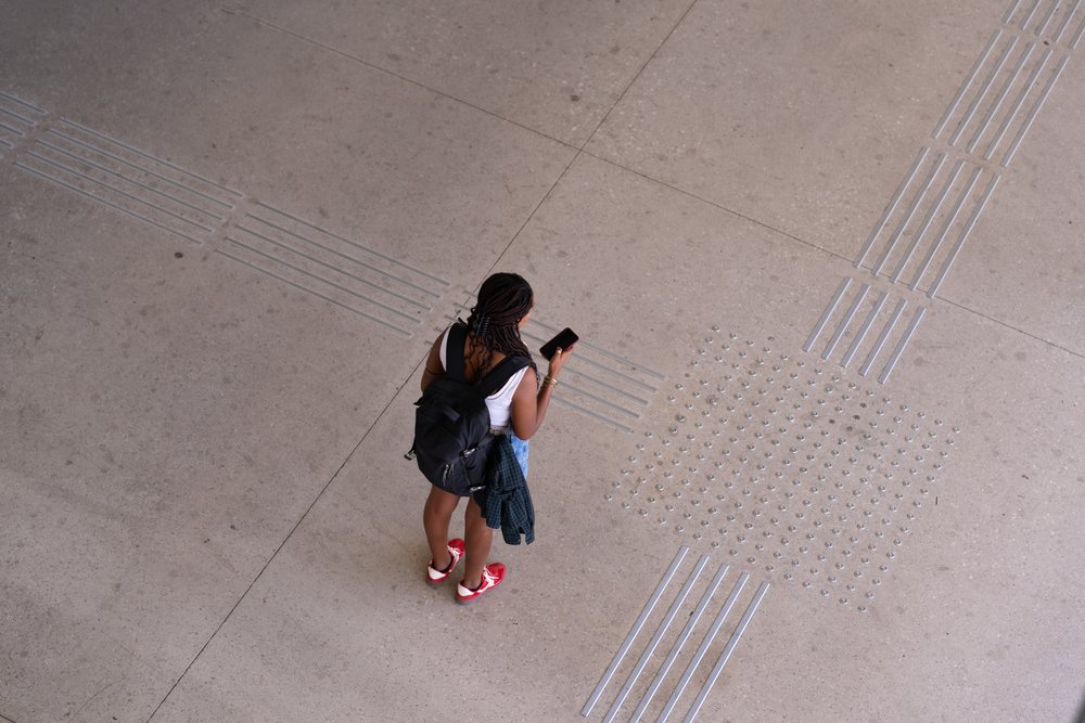A African American woman looking at her phone