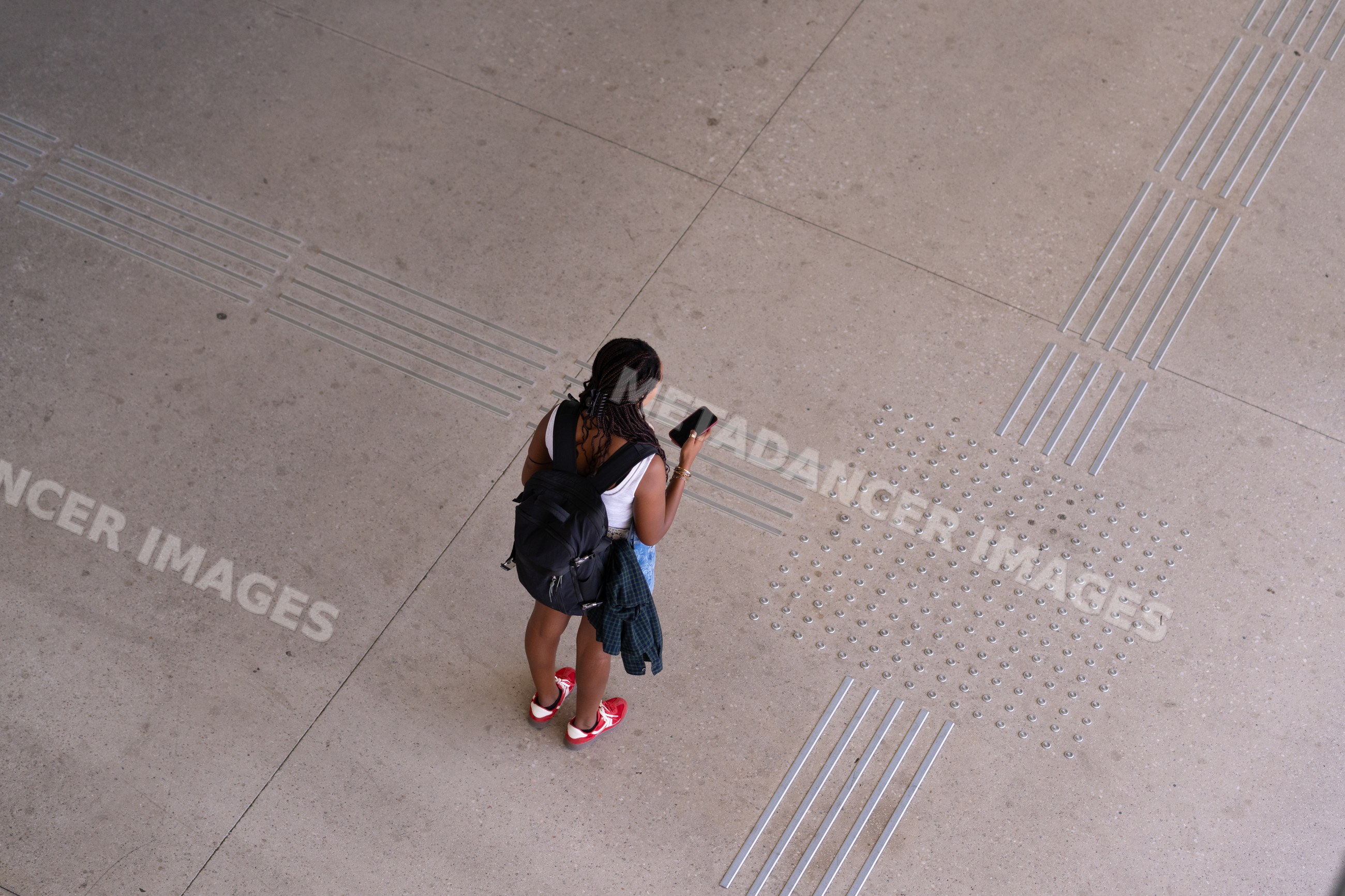 A African American woman looking at her phone