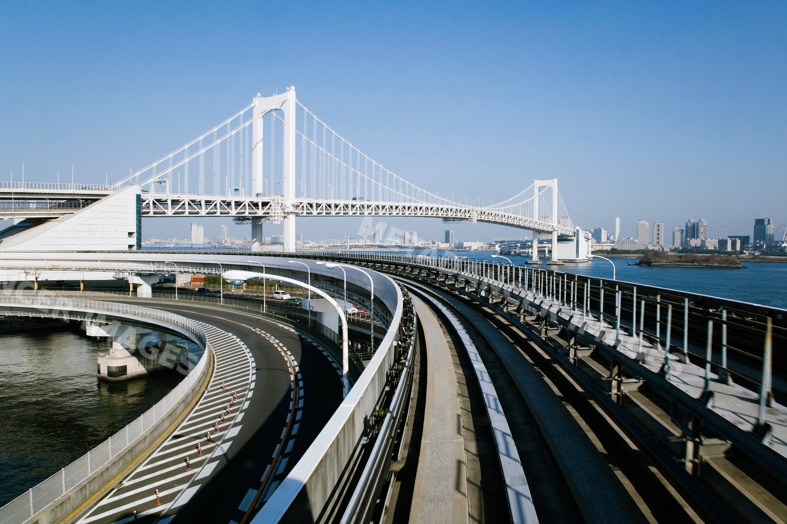 Rainbow bridge and yurikamome monorail waterfront cityscape