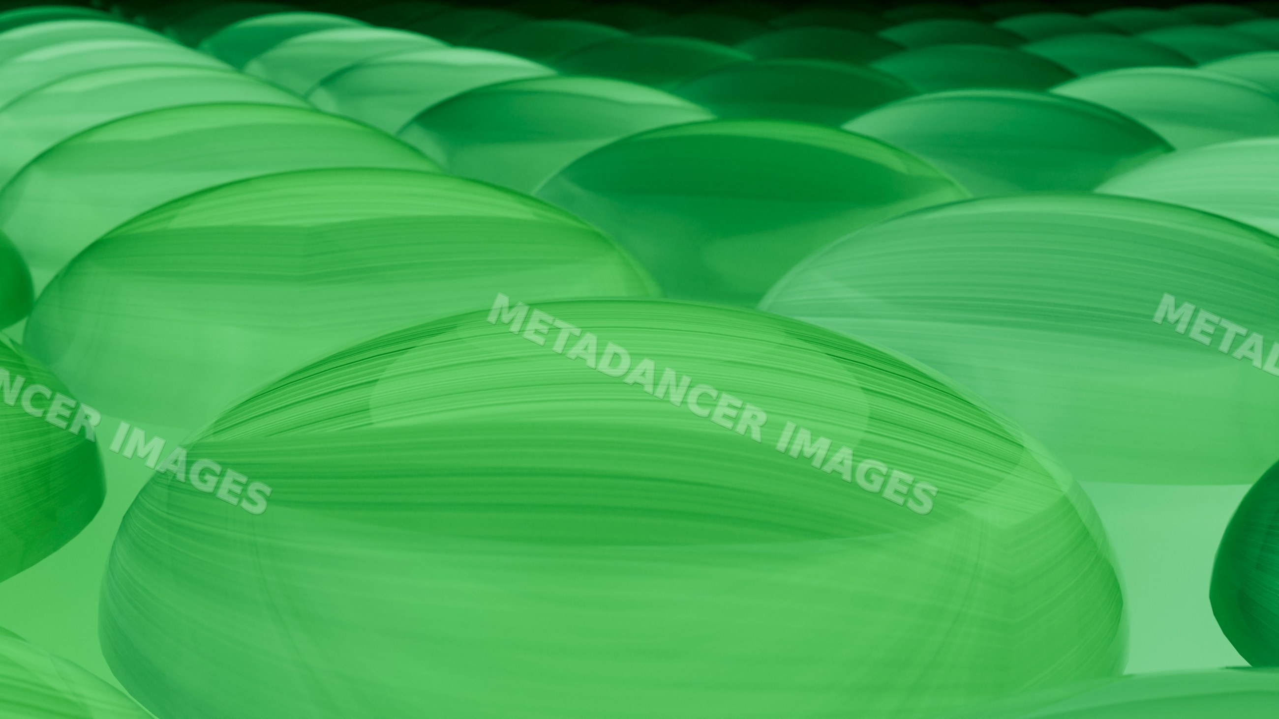 Smooth translucent green spheres in abstract digital illustration