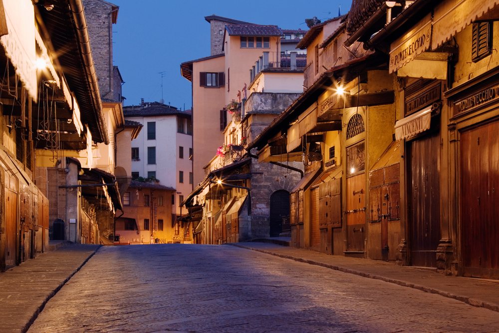 Evening view of ponte vecchio historic street, italy