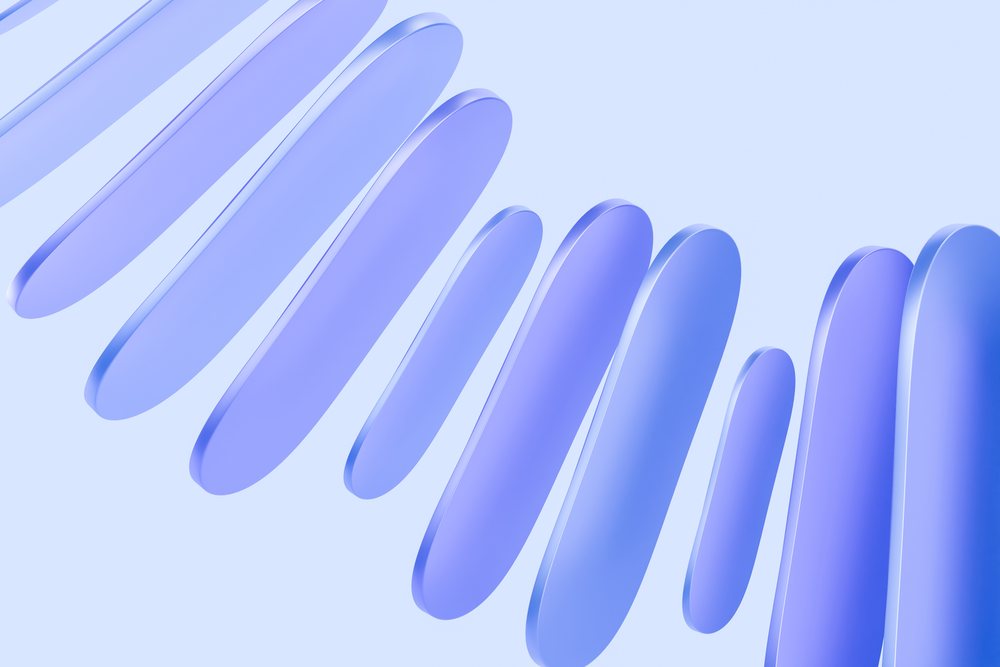 Abstract 3d digital render of smooth blue shapes on light background