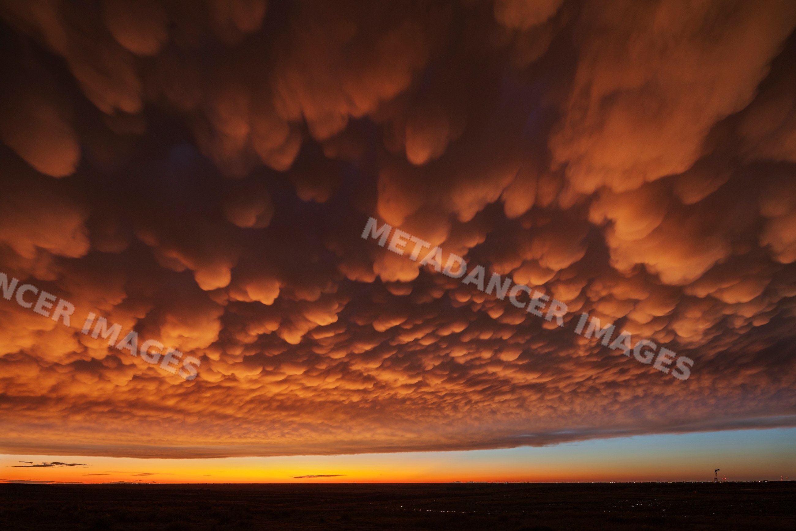 Mammatus cloud formation glowing at Dusk over Great Plains