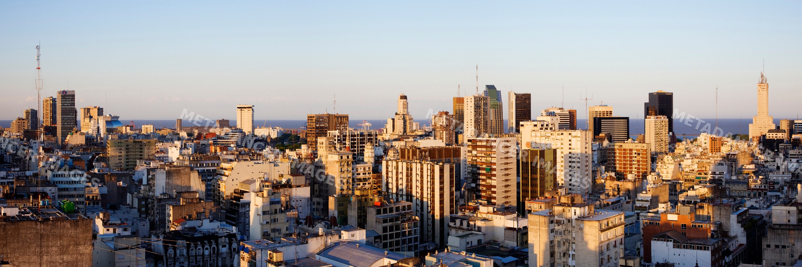 Buenos aires cityscape with skyline and atlantic ocean at sunset