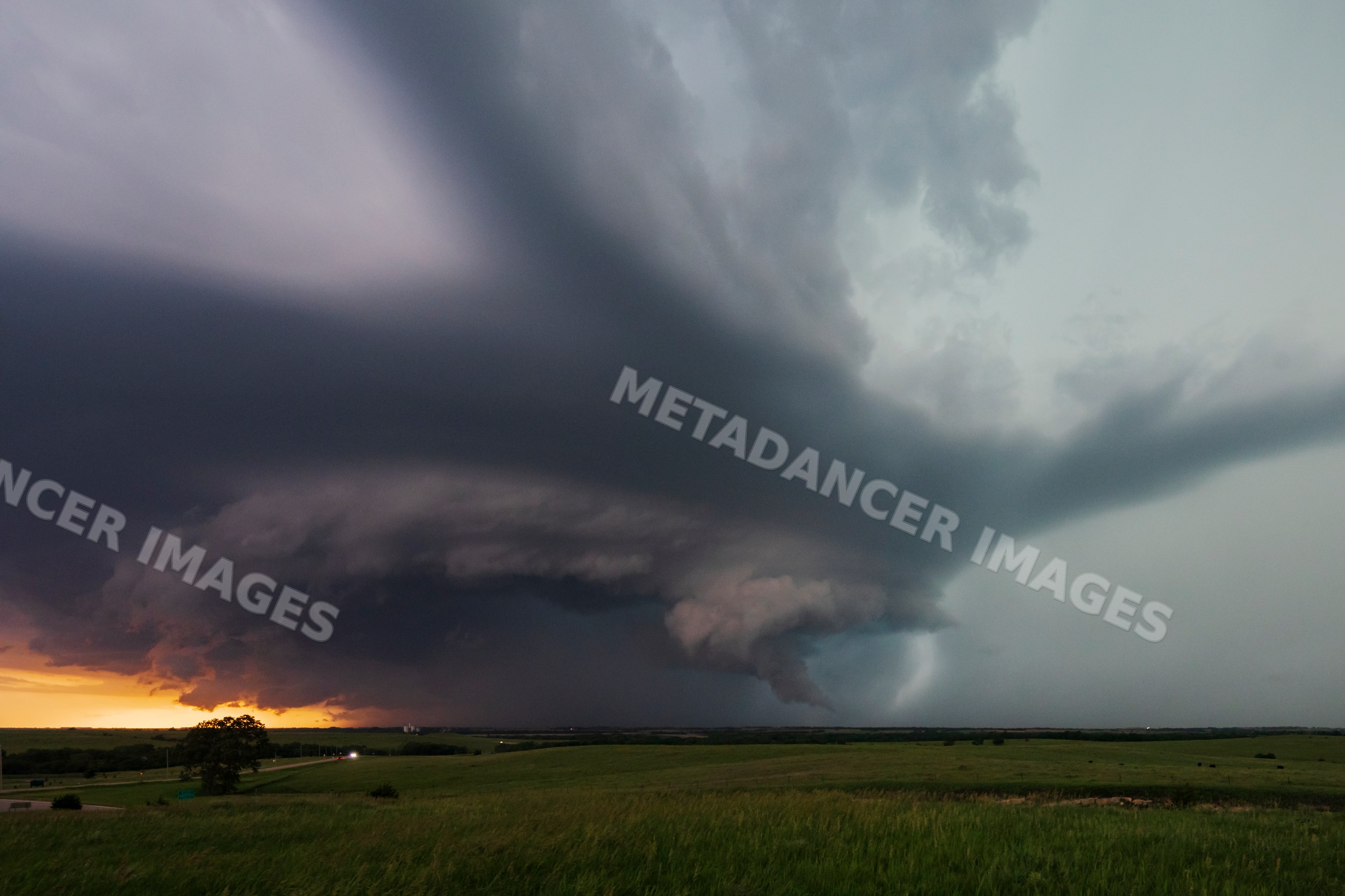 Tornado-warned supercell storm near Salinas kansas at sunset