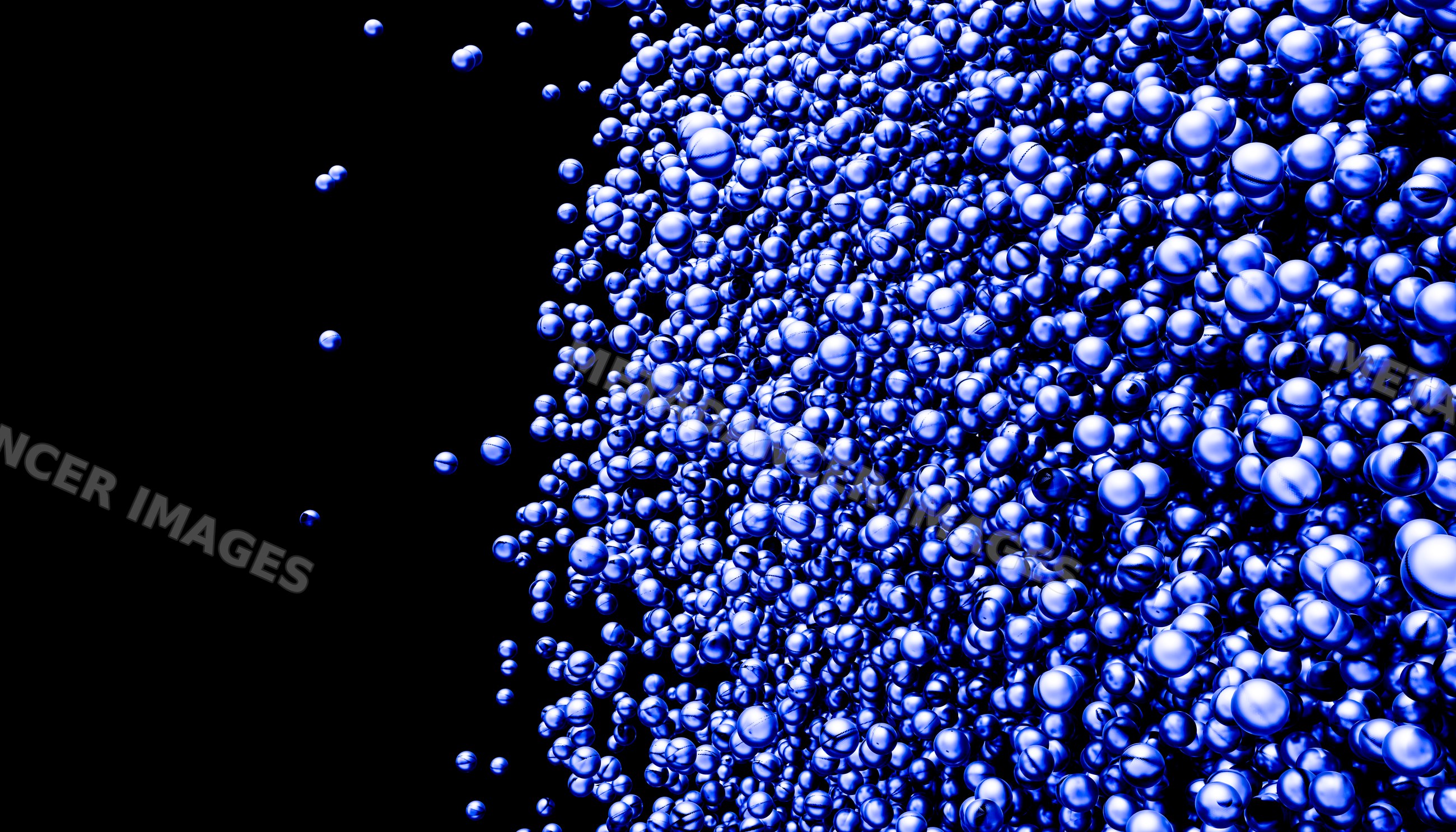 A cluster of blue bubbles floating against a black background