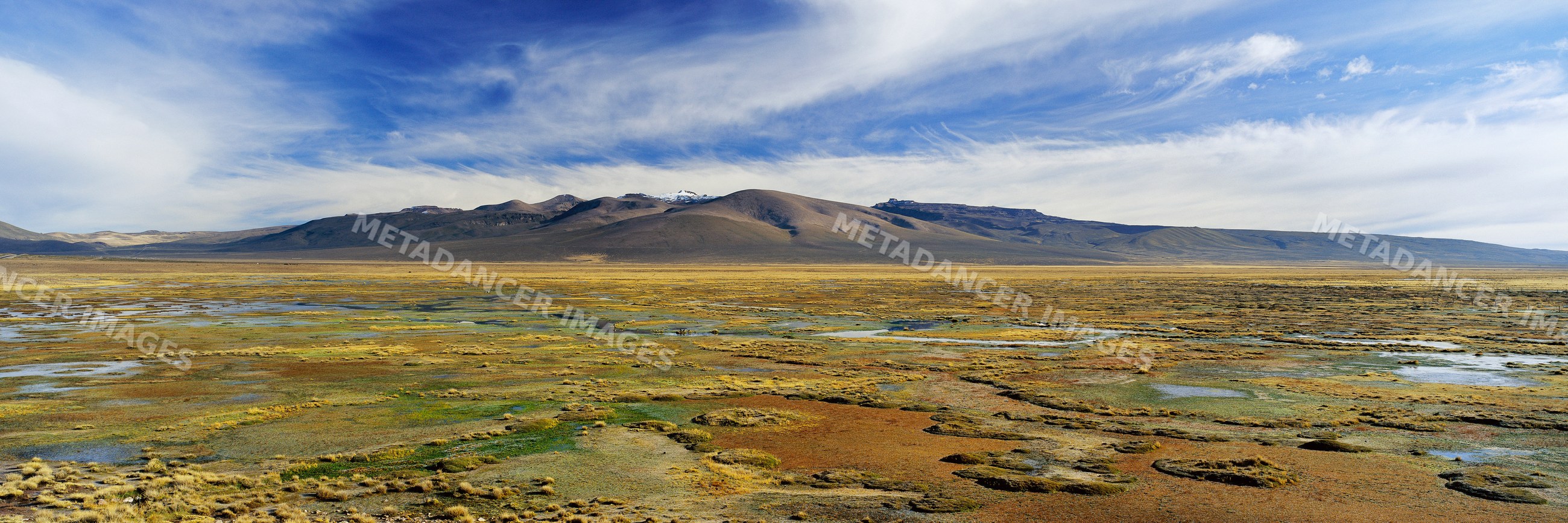 Grassland and mountains at salinas aguada blanca national reserva