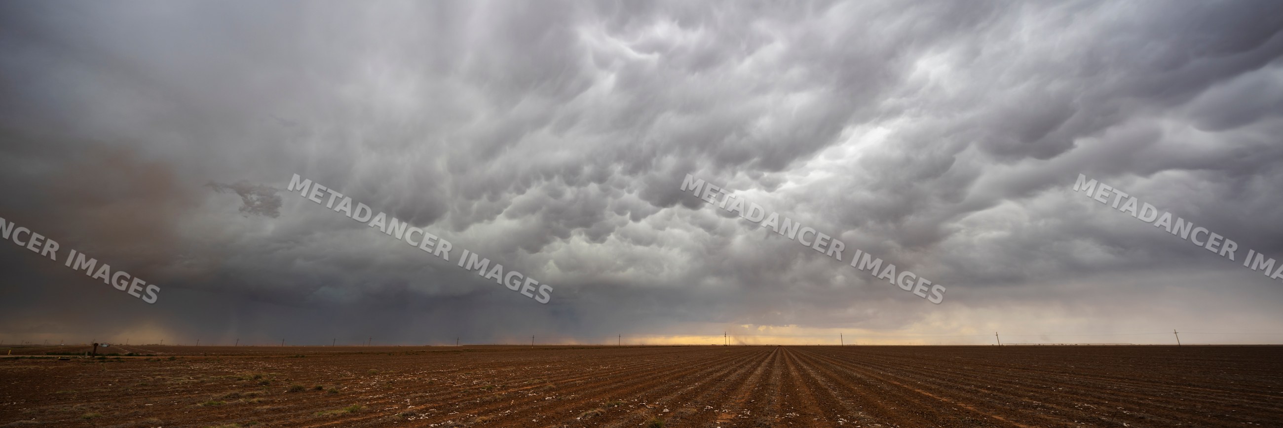 Mammatus Clouds over plowed field in floydada, texas, USA