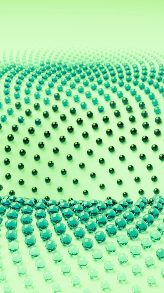 Abstract pattern of green transparent glass spheres